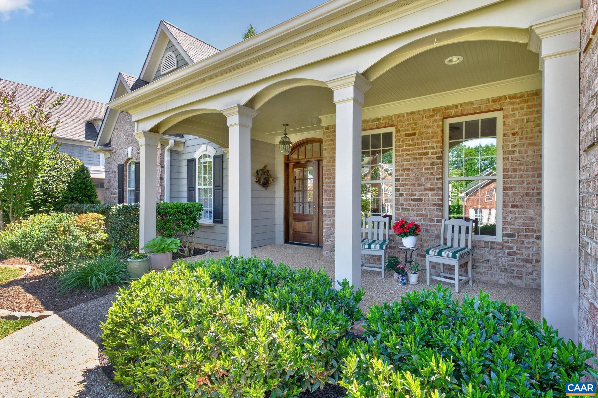 OPEN HOUSE-Sunday-7/19 from 12-2pm. A truly unique custom-built home, exceptional in its design, craftsmanship, and architectural detail. From the moment you arrive, the striking mahogany front door sets the tone for the quality and character found throughout. Inside, you'll find thoughtfully designed main-level living enhanced by extensive wainscoting, crown molding, and upgraded trim. The great room features custom built-ins, while the kitchen showcases soapstone countertops, a farmhouse sink, and coffered ceilings that blend style and function. The primary suite offers a private retreat with a luxurious soaking tub. An additional living area with a kitchenette provides the perfect space for an in-law suite or extended guests. Storage is abundant throughout, with a spacious  oversized garage, an outdoor storage shed, and a deck storage box providing ample room for all your belongings. Step outside to enjoy the private backyard, ideal for relaxing or entertaining. Additional features include a generator hookup, water softener system, and a utility sink in the laundry room. This exceptional home offers timeless design, quality construction, abundant storage, and the flexibility today's buyers are looking for.,Fireplace in Great Room