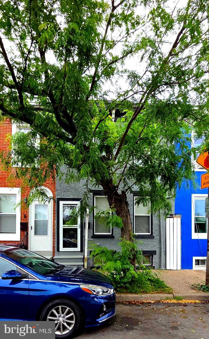Wow! Footsteps to Downtown Skyline,  Stylish restored luxury townhouse overlooks park. This spacious solid brick home is in Quaker Hill / Trinity Vicinity area . Nice curb appeal and once inside, the open floor plan with restored real hardwood floors, exposed brick walls, main level open living/ dining area, main level laundry with stackable , powder room, bright kitchen with new stainless steel appliances. Fenced in backyard and comfortable deck . Lower level upgraded HVAC and great storage and potential uses. Upper level has spacious 3 bedrooms and tile main bath. This property is eligible for special financing for qualified first time homebuyers as well. Motivated Seller! Refreshed and turn key ready for investor or homeowner.