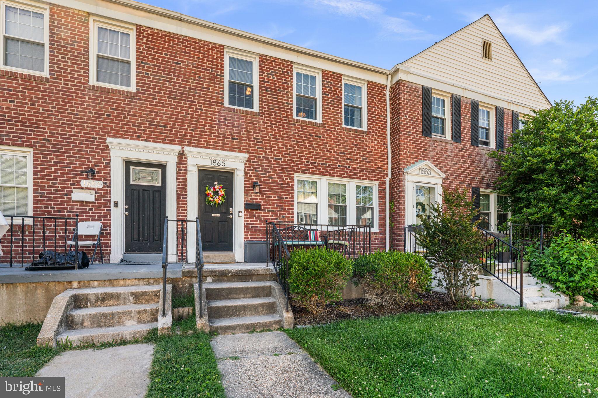 Welcome to this well-maintained all-brick 3-bedroom townhome offering timeless charm, versatile living spaces, and a convenient location. Gorgeous hardwood floors flow throughout the main and upper levels, creating a warm and inviting atmosphere.


The pretty white kitchen features granite countertops and stainless steel appliances, including a gas range with microwave range hood. A door from the kitchen provides easy access to the rear deck and backyard, making outdoor dining and entertaining a breeze.


Upstairs, you'll find a full hallway bathroom, a charming built-in bookshelf, and three comfortable bedrooms. The finished lower level expands the living space with a spacious second family room, a convenient half bath, and an additional room ideal for a home office, fitness area, hobby room, or guest space. A dedicated laundry room and direct access to the backyard add to the home's functionality.


Outside, enjoy the backyard space perfect for relaxing, gardening, or entertaining. Conveniently located near shopping, dining, and major commuter routes, this home offers easy access to everything you need while providing comfortable living in a classic all-brick setting.