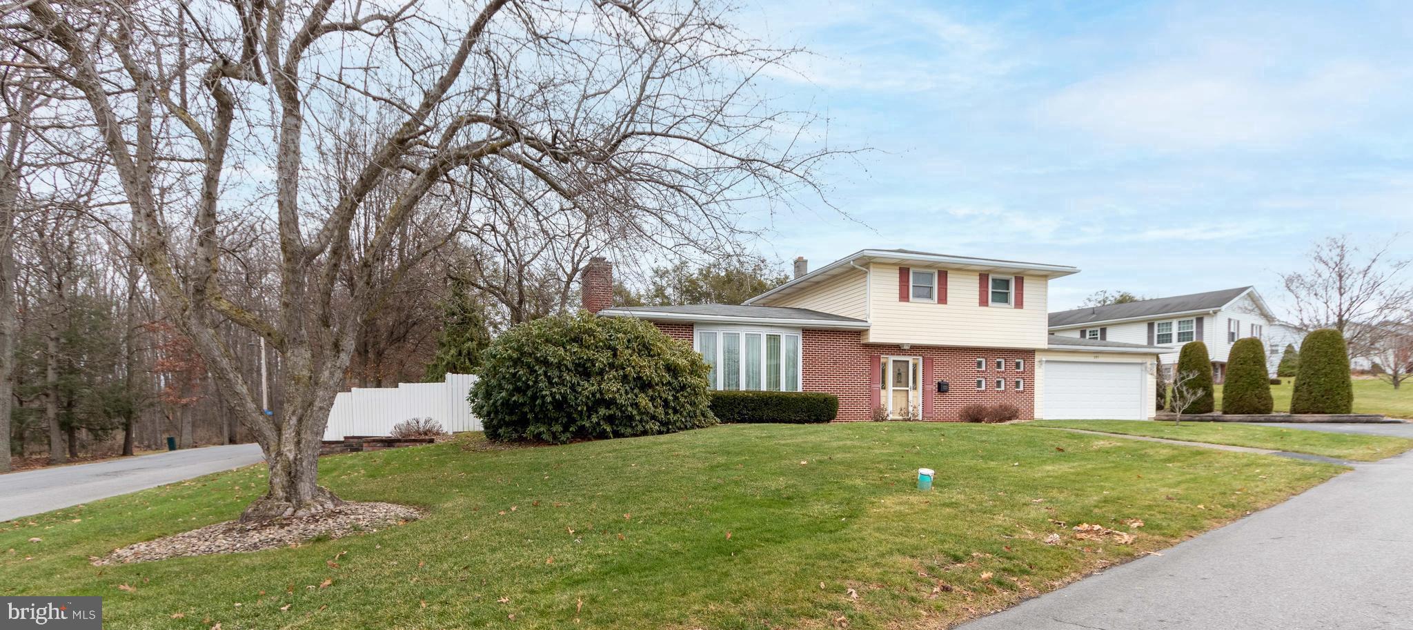 Welcome to this charming single family home for sale in the desirable neighborhood of Philips Heights. Conveniently located close to both the school and town, this house sits on a corner lot, providing privacy and a sense of space.

As you enter the home, you'll be greeted by a split-level layout that exudes mid-century modern vibes. The slate entry sets the tone for the unique character of this home. The living room is the perfect place to relax, with a stone, gas-burning fireplace that adds both warmth and ambiance and tons of natural light. The formal dining area is ideal for entertaining guests or enjoying family meals.  The adjoining kitchen features a breakfast area, perfect for casual dining, and overlooks a small den area where a wood or pellet stove could be added  back in. The main level also includes a convenient laundry area and a private office, providing a quiet space to work from home.  The mini-split cooling system ensures that the main living area remains comfortable throughout the warmer months of the year. Moving to the upper level, you'll find three generous bedrooms and a full bathroom. Each bedroom offers ample space for relaxation and rest.  The lower level of the home is currently unfinished, but offers endless possibilities. Whether you're looking to create additional living space, a home gym, or a playroom, this blank canvas allows you to customize the space to fit your needs.  A two-car garage provides plenty of room for parking and storage.

Outdoor enthusiasts will appreciate the proximity to Cold Stream and various walking trails, perfect for enjoying nature and staying active. The private backyard is surrounded by vinyl privacy fencing, ensuring a peaceful and secluded atmosphere. The highlight of the backyard is the inground, heated pool, which allows you to take a refreshing dip during the summer/fall months.  This home has been well-maintained, ensuring that you can move in and start enjoying all it has to offer immediately. Don't miss the opportunity to make this charming property your own. Schedule a showing today and experience the comfort and convenience of living in Philips Heights.