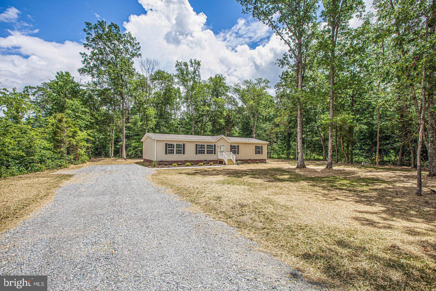 One level home on 2 acres...4 bedrooms and 2 full bathrooms.  approx. 1600 finished square footage..Rear deck leads to flat back yard. . Great loctaion, close to route 1 and i-95.  NO HOA!