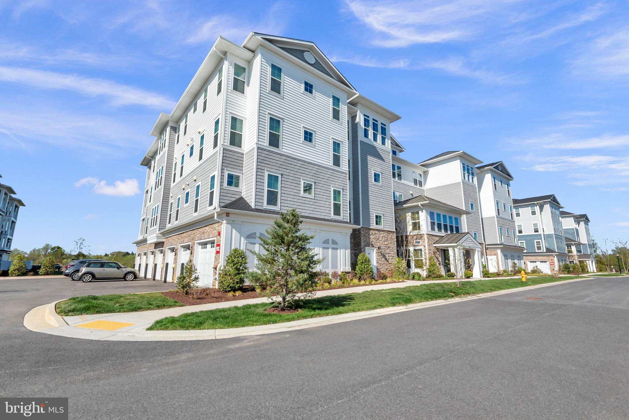 A rare blend of coastal proximity and refined living unfolds within this beautifully appointed corner residence in the sought-after 55+ waterfront community of Four Seasons at Kent Island. Built in 2024 and impeccably maintained , this  like-new residence offers  the comfort of immediate enjoinment without the wait for new construction.

Positioned near  a tranquil creek leading to the Chesapeake Bay, the home offers a lifestyle deeply connected to the water without the demands of direct waterfront ownership.

Sunlight fills the open-concept layout through the residence’s desirable corner positioning, highlighting soaring ceilings, luxury vinyl plank flooring, and thoughtfully selected finishes throughout. The gourmet kitchen flows seamlessly into the dining and living areas, creating an inviting space for both quiet evenings and entertaining.

Just beyond, a private balcony offers peaceful green surroundings with subtle water views, extending  the home’s living space into a serene outdoor setting. The spacious primary suite serves as a private retreat with walk-in closets and a beautifully finished en-suite bath, while two additional bedrooms provide flexibility for guests, hobbies, or a home office.

Residents of Four Seasons at Kent Island enjoy access to resort-style amenities including indoor and outdoor pools, fitness center, clubhouse spaces, pickleball and tennis courts, scenic walking trails, kayak launch, and fishing pier.

Conveniently located near Kent Narrows, Annapolis, and Route 50, this exceptional residence offers a refined Eastern Shore lifestyle with easy access to dining, recreation, and waterfront experiences.