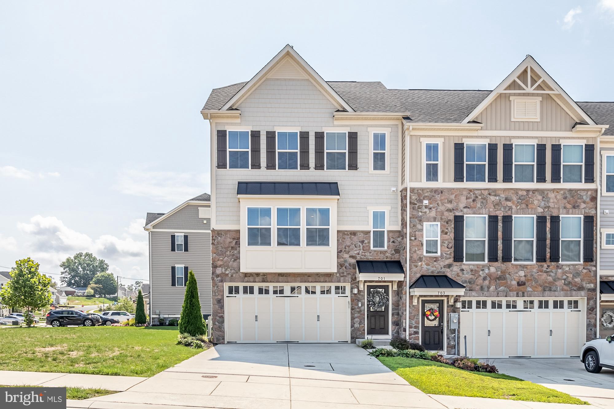 This is the one you have been waiting for!  Largest floor plan, end-unit townhome,  in the highly desirable Magness Mill Community! Being an EOG, this gorgeous home is drenched in natural light having extra windows from top to bottom.  Enter into the fully finished lower level that has endless possibilities. It includes a 4th bedroom,  a closet, full bath,  large living/den space with a glass paned door for privacy.   The large living/den space can also be used as a play room, office space or  family room. There is also a large finished storage room on this level. This home has a walk out  that opens to a patio with access to the back yard and large side yard area.  The main level living space is open, bright and includes a 20x20 living area, gorgeous kitchen with 42" cabinets, a large island,  granite counter tops, breakfast bar and  stainless steel appliances to top it off. It also includes an additional large flex space that can be used as a sitting area or a space for a table that has direct access to the extra large composite deck off the back.  It allows for ease of flow for entertaining.  The top level includes a huge master bedroom with 12'x10' sitting area, two walk-in closets, and a  large ensuite bathroom. Two additional bedrooms located on this level have ample closet space.  A hall bath and  a large laundry closet, with front load washer and dryer complete the top level. The home has a neutral color palate so your clients can bring their vision to life. The home includes the Nest smart home system. Professional Photos coming soon!