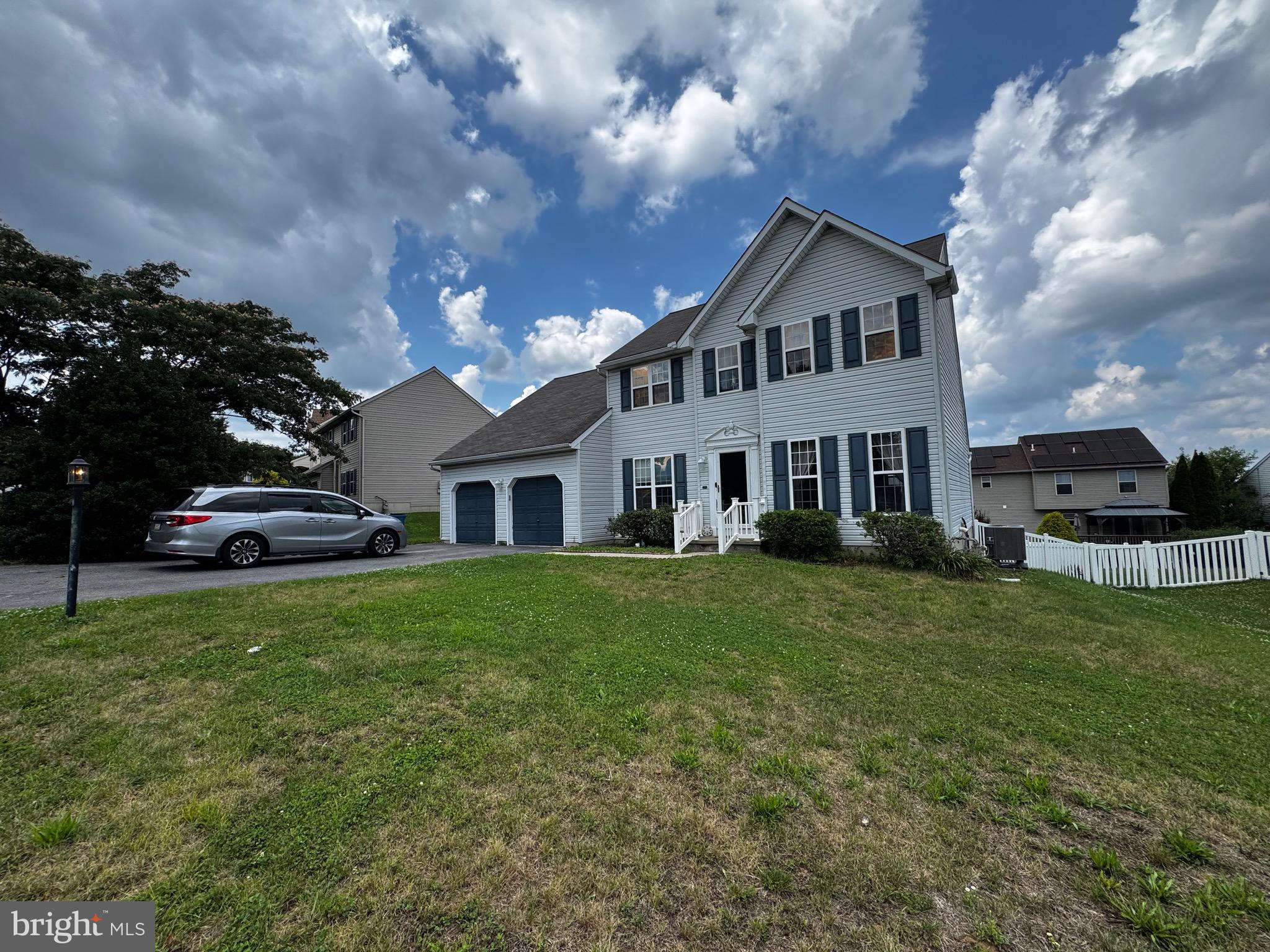 This spacious 2002 built home has a 1st Floor Primary Bedroom Suite with a Full Bathroom. Laundry is also located on the 1st Floor, along with another Half Bathroom. If you've been looking for 1 floor living this is the place. Upstairs you'll find another 3 Bedrooms & a Full Bathroom. One of those 3 bedrooms upstairs is as big as a family room. An attached 2 Car Garage + Fenced Yard add to its convenience. A Elevated Deck off the Living Room / Kitchen Area gives you a great view of the neighborhood. 

The home  needs a little TLC. This is great opportunity for an investor or a homeowner who wants immediate equity. Priced to sell fast, this will not last long. Hurry to see the inside before it's gone.