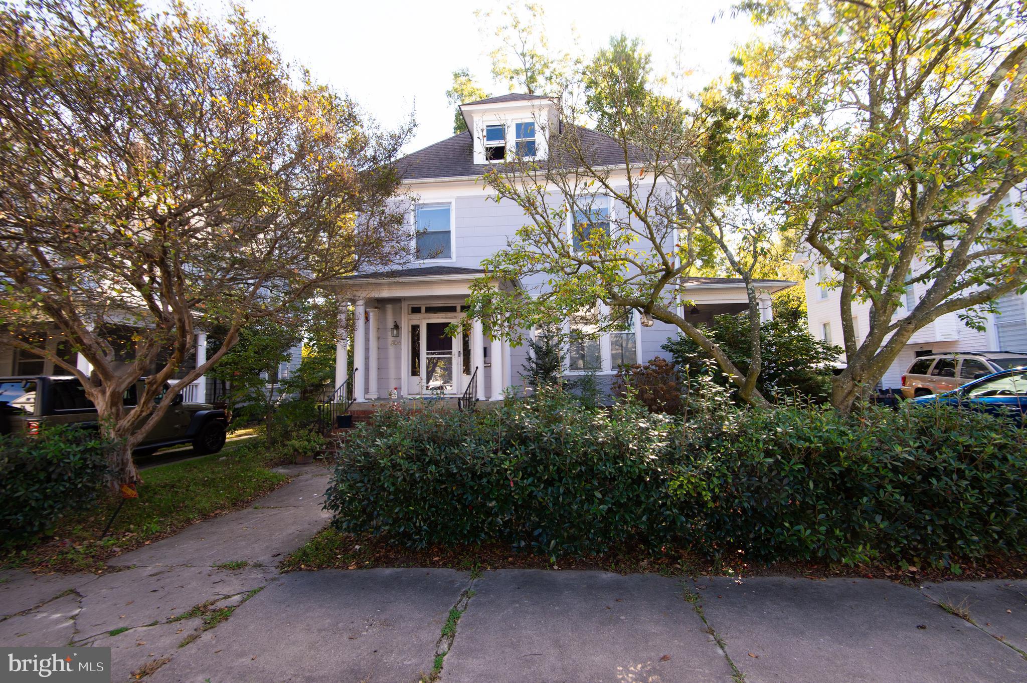 NEW PRICE: $389,900! Exceptional square footage value in the Historic District. This spacious 4-bedroom, 2-bathroom home is much larger than it looks, offering loads of living space and beautiful historic charm—highlighted by gorgeous hardwood floors and a stunning stained-glass window. Enjoy the modern conveniences alongside classic grace. Outdoors, you'll find a fully fenced yard plus a major historic district rarity: a concrete driveway for ample off-street parking and a detached garage! Don't miss this incredible opportunity.