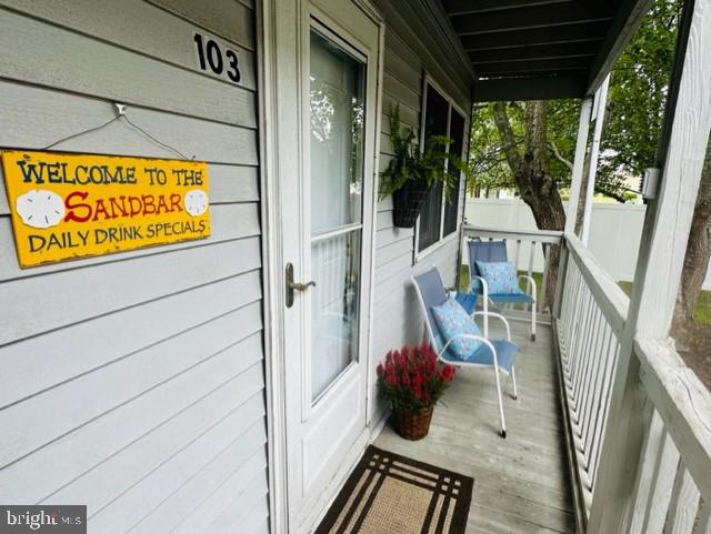 This North Ocean City 2 bedroom 1 bath totally remodeled getaway won't last long.  All new from the studs out including new drywall, new kitchen with attractive pale gray cabinets, new kitchen appliances, water-proof plank flooring throughout, fresh paint, and all new beach furnishings that convey with the sale.  This small and cozy complex is just a short stroll to the beach, bus stop, shopping, and restaurants.  Make this one your home away from home!!