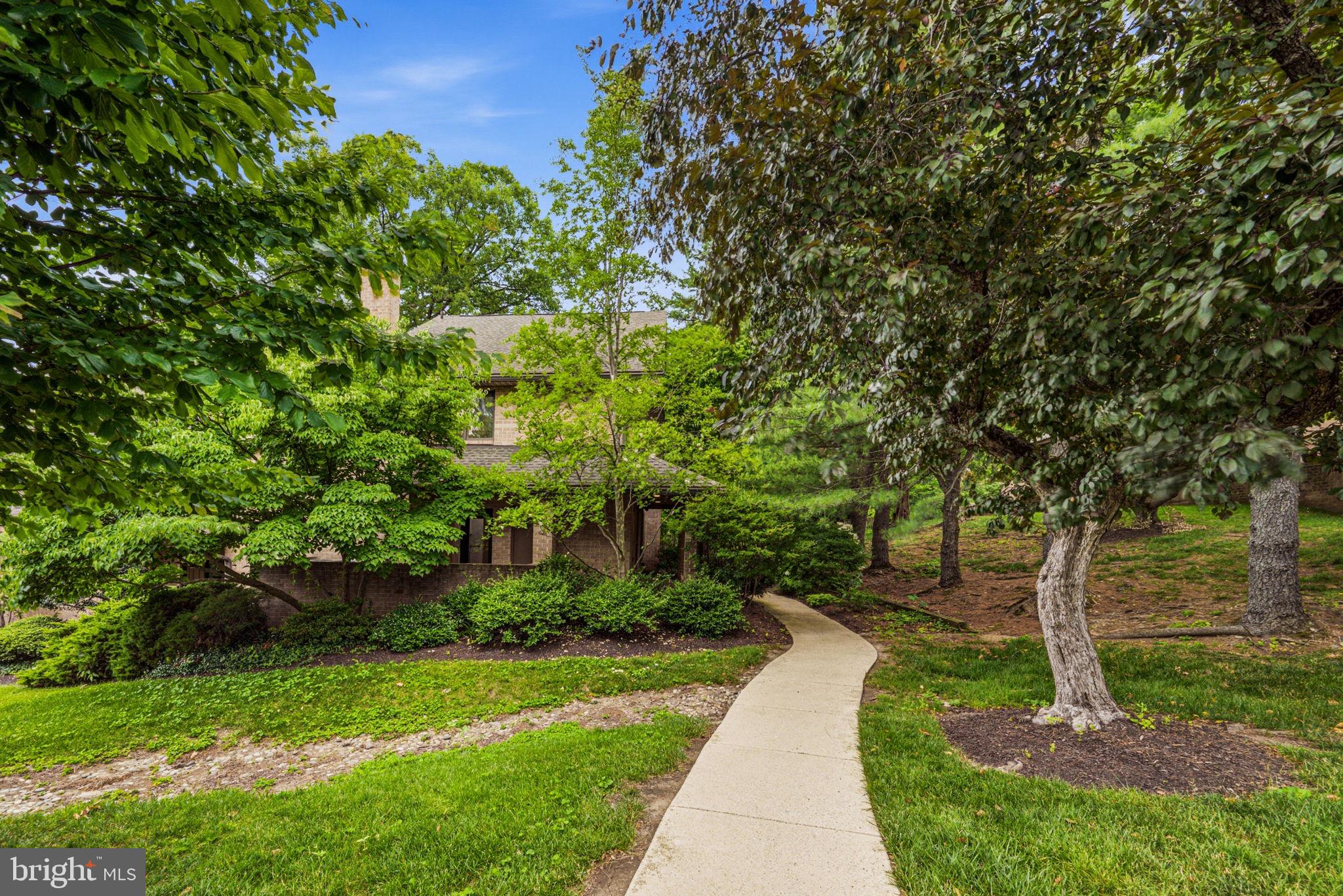 Welcome to 347 Paoli Woods, an exceptional END-UNIT townhome offering the perfect blend of MAIN LINE convenience, LOW-MAINTENANCE comfort, natural privacy and peaceful living.  Situated in the desirable PAOLI WOODS community of TREDYFFRIN Township and TREDYFFRIN-EASTTOWN SCHOOL DISTRICT, this spacious 4-bedroom, 3 1/2-bathroom home features 1,971 sq ft of versatile living space. Enjoy unbeatable transit access, located just 0.5 miles from Paoli Station for an effortless commute and the Paoli Shopping Center for everyday just around the corner. Follow the walkway to the side entrance and step into the foyer with access to hall closet and half bath. Step down into the cozy den with a wood burning fireplace, large utility closet and it's own patio. The hardwood flooring flows into the light kitchen with granite countertops offering plenty of prep space for the active home cook. The hardwood flooring seamlessly continues into the dining room that opens to the large living room space with a 2nd wood burning fireplace. Step outside from the living room to a spacious private patio, creating an ideal extension of the living space for entertaining, relaxing and unwinding outdoors.  The second level features brand-new carpeting throughout, including the primary suite with a walk-in closet and private bath. Two additional bedrooms share a hall bath, and a conveniently located laundry closet adds everyday ease.. The third level offers a 4th bedroom suite with a large walk-in closet and it's own full bath. The GARAGE bonus - this home includes a detached single-car garage adding practical covered parking and highly coveted extra storage space. Not to miss, there is additional storage in an outside access closet off the front patio.  Combining a prime location with move-in ready appeal, this home offers the convenience and comfort to experience the best in Main Line living.  Don't delay before this opportunity could slip away . (More photos coming soon...stay tuned)