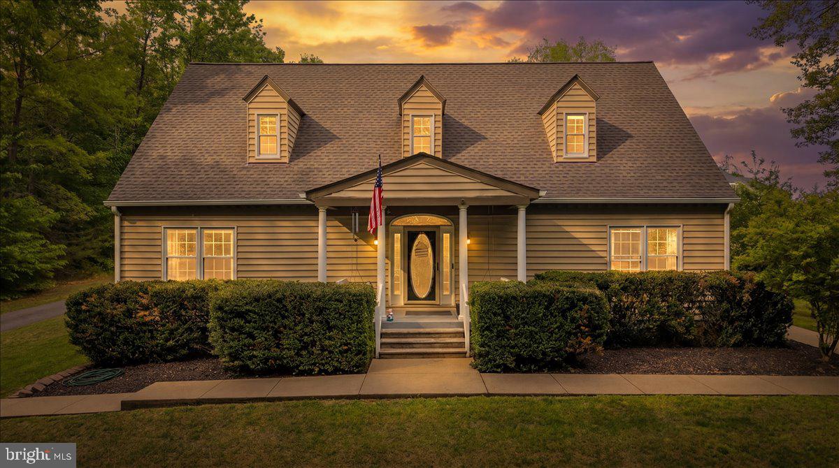 Completely renovated home on acreage in Spotsylvania VA offering space, privacy, and modern upgrades just minutes from shopping, dining, and commuter routes. Located in the desirable Courthouse Crossings community, this updated Cape Cod sits on 2.38 private wooded acres and features over 4,400 square feet of finished living space, making it an ideal choice for buyers searching for homes with land in Spotsylvania County.

This 5-bedroom, 3.5-bath home (including a finished lower-level bedroom) has been extensively upgraded and is truly move-in ready. Major system updates include a new roof and gutters (2025), two new HVAC systems (2025), and a newer water heater (2024)—providing long-term peace of mind for today’s buyers.

Inside, the home has been fully refreshed with newly refinished hardwood floors, fresh interior paint, and recently updated primary bathroom and guest bedroom, all completed just prior to listing. The main level offers a highly desirable layout with a primary suite on the main floor, formal dining room, and an open-concept kitchen that flows into the main living areas—perfect for everyday living and entertaining.

Upstairs features generously sized bedrooms and flexible living space, while the fully finished basement expands the home’s versatility with a second kitchen, full bathroom, and additional bedroom (NTC)—ideal for buyers looking for multi-generational living, in-law suite options, or a private guest space.

Outdoor living is just as impressive with a private wooded lot, expansive yard space, and room to enjoy the peaceful setting. Buyers searching for homes with acreage near Fredericksburg, homes with finished basements, or move-in ready homes in Spotsylvania will appreciate the rare combination of upgrades, square footage, and land this property offers.

Conveniently located near Southpoint, I-95, and major commuter routes, this home delivers both privacy and accessibility—an increasingly rare find in today’s market.

Homes for sale in Spotsylvania VA with this level of renovation, acreage, and flexibility are limited—schedule your showing today.