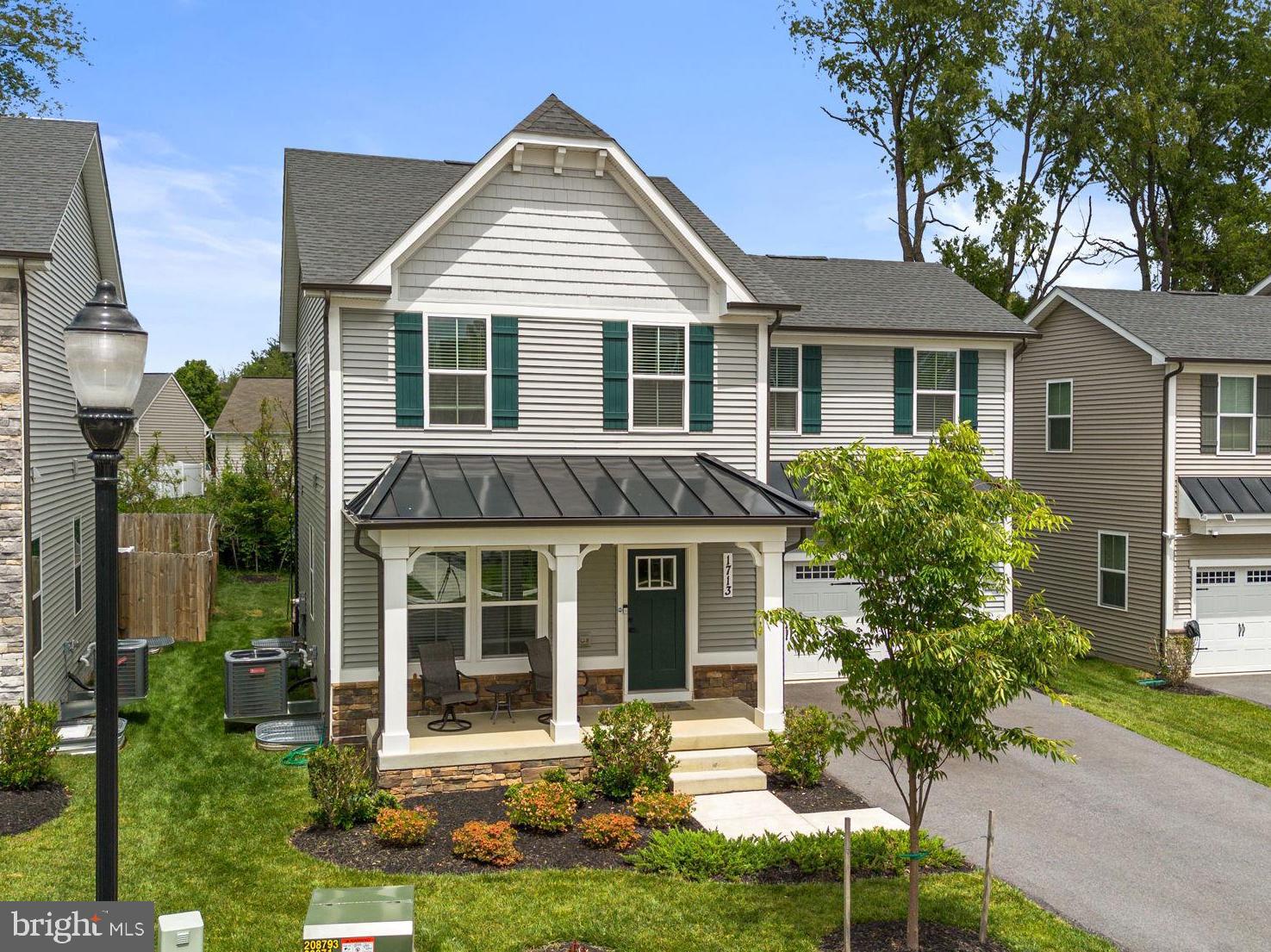 Welcome home to 1713 Aurora Way — a beautifully designed home built in 2023 that perfectly blends modern style with warm, comfortable living. Offering 4 bedrooms and 3.5 bathrooms, this thoughtfully designed home is move-in ready and filled with upgrades throughout.

Step inside to find a bright, open layout featuring matte black finishes and a stunning white kitchen accented by a unique matte black backsplash that adds depth, contrast, and modern character. The spacious kitchen opens seamlessly into the main living and dining areas, making everyday living and entertaining feel effortless.

Upstairs, you'll find a versatile loft that creates the perfect second living area, playroom, home office, or cozy retreat. The spacious owner’s suite offers a relaxing escape with a large walk-in closet and beautifully appointed en-suite bath. Two additional bedrooms provide generous space and storage.

The fully finished basement expands the home even further with an additional bedroom, full bathroom, and rec room — ideal for guests, multigenerational living, or flexible bonus space.

Outside, enjoy relaxing evenings or weekend gatherings on the paver patio, designed with entertaining in mind. The home also offers exceptional parking with a 2-car garage, driveway space for 4 additional vehicles, plus ample street parking nearby.

Located in a vibrant community with scenic walking trails and paths throughout, this home is just a short walk to Baker Park, Hood College, Frederick Health Hospital, and Fort Detrick, while Downtown Frederick’s shops, restaurants, and entertainment are only minutes away.

Built only in 2023, major components including the roof, HVAC system, appliances, and tankless water heater offer the peace of mind and efficiency that come with newer construction living.

Beautifully maintained and thoughtfully upgraded throughout, this is a home you won’t want to miss — schedule your private showing today.