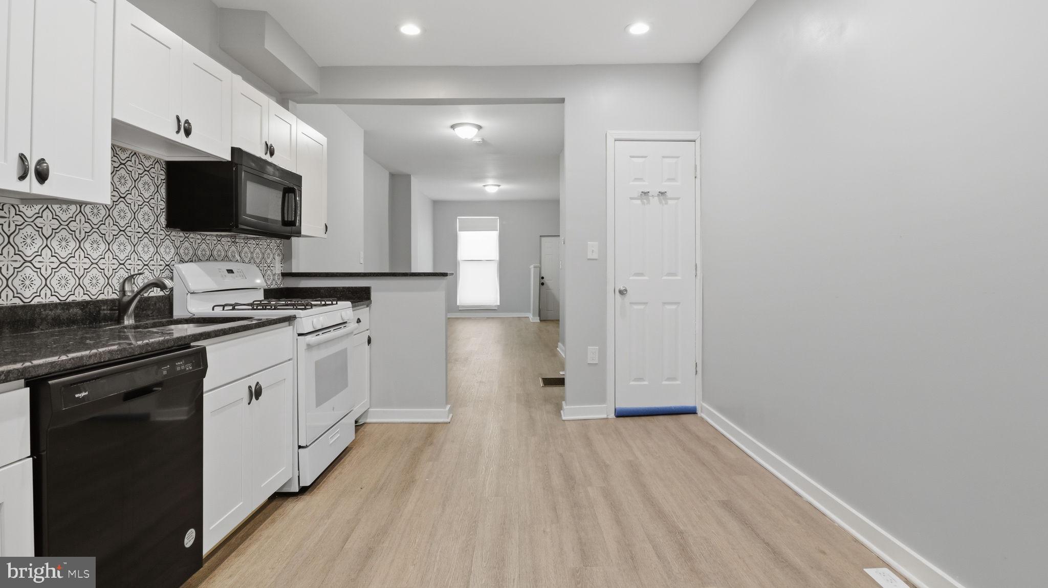 This thoughtfully improved home offers modern comfort and style in a convenient Baltimore City location. Recent renovations have transformed the interior into a bright, welcoming space perfect for today's lifestyle.
The open floor plan creates an airy, flowing layout ideal for both daily living and entertaining, while luxury vinyl plank flooring throughout provides durability and contemporary appeal. Fresh paint in neutral tones brightens every room, complemented by abundant natural light streaming through large windows. Upgraded fixtures add polish and functionality throughout the home, completing the modern aesthetic.
Located in a prime area with easy access to Baltimore's most desirable neighborhoods, 713 Belnord Avenue puts you minutes from the Inner Harbor, Canton, Federal Hill, and Fells Point. Enjoy the perfect balance of suburban comfort with quick access to Baltimore's vibrant dining, entertainment, and cultural attractions.
This turnkey property is ready for you to move in and start enjoying immediately. Don't miss this opportunity to own a renovated home in such a well-connected location.