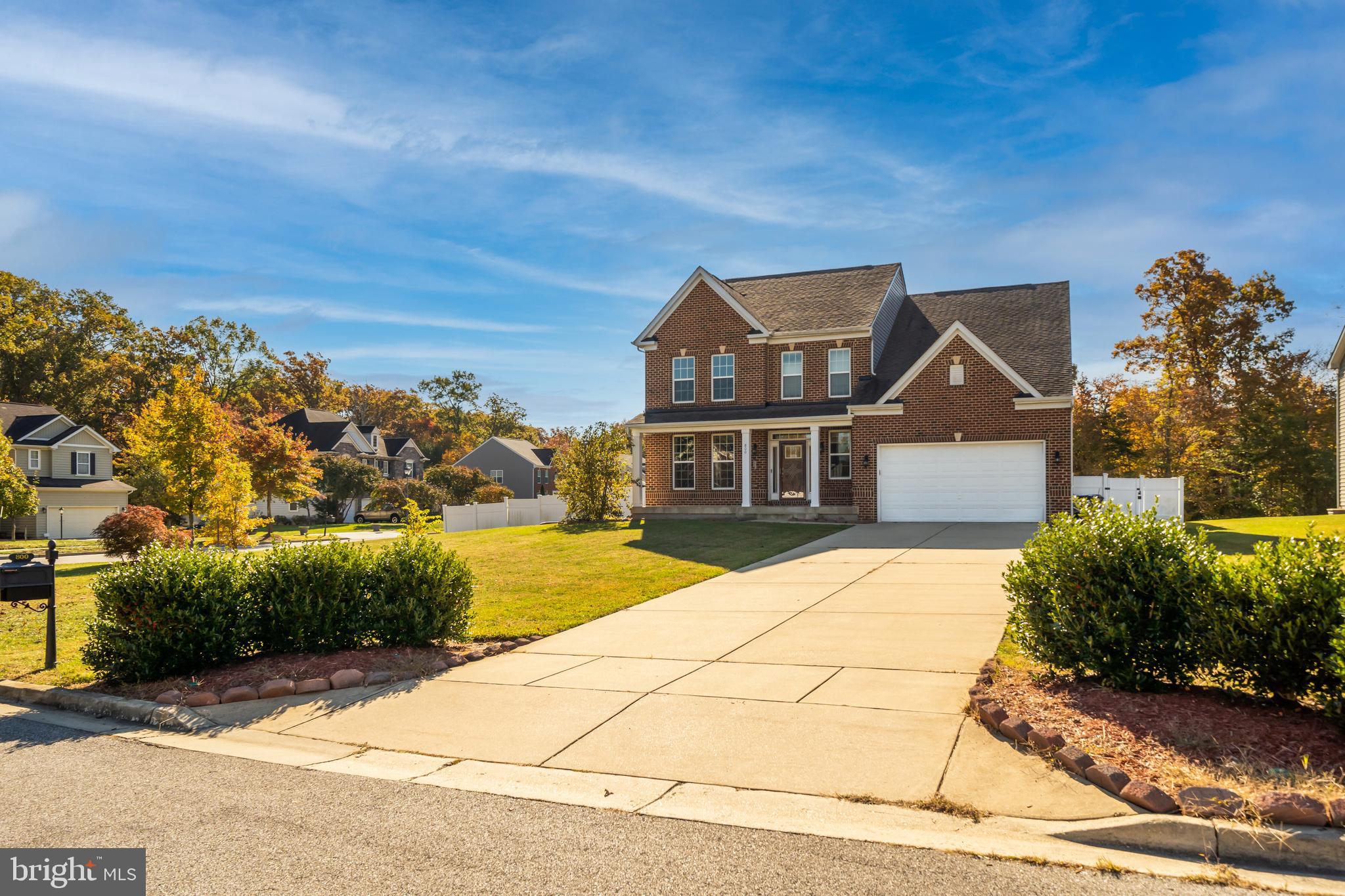 Short Sale professional negotiated pending 3rd party approval. 
Nestled in the serene Broad Creek Hollow community, 800 Naeve Ct. in Accokeek, MD, was the model home for the community and it perfectly blends luxury and convenience. This traditional single-family home, with its open floor plan, features six bedrooms and four bathrooms. The main floor is adorned with beautiful flooring and custom window treatments, while the kitchen boasts upgraded cabinets, granite countertops, and stainless steel appliances, all illuminated by abundant natural light. The luxurious master suite offers dual vanities, a soaking tub, a separate shower, and a huge walk-in closet, providing endless indoor space for comfort and relaxation. Situated on a corner lot, the property includes a large, fenced backyard and ample parking with a two-car garage and a driveway accommodating up to six cars. With quick access to National Harbor, Northern Virginia, and Washington, DC, this home is a true gem, offering impressive interior and exterior spaces for both entertaining and everyday living.