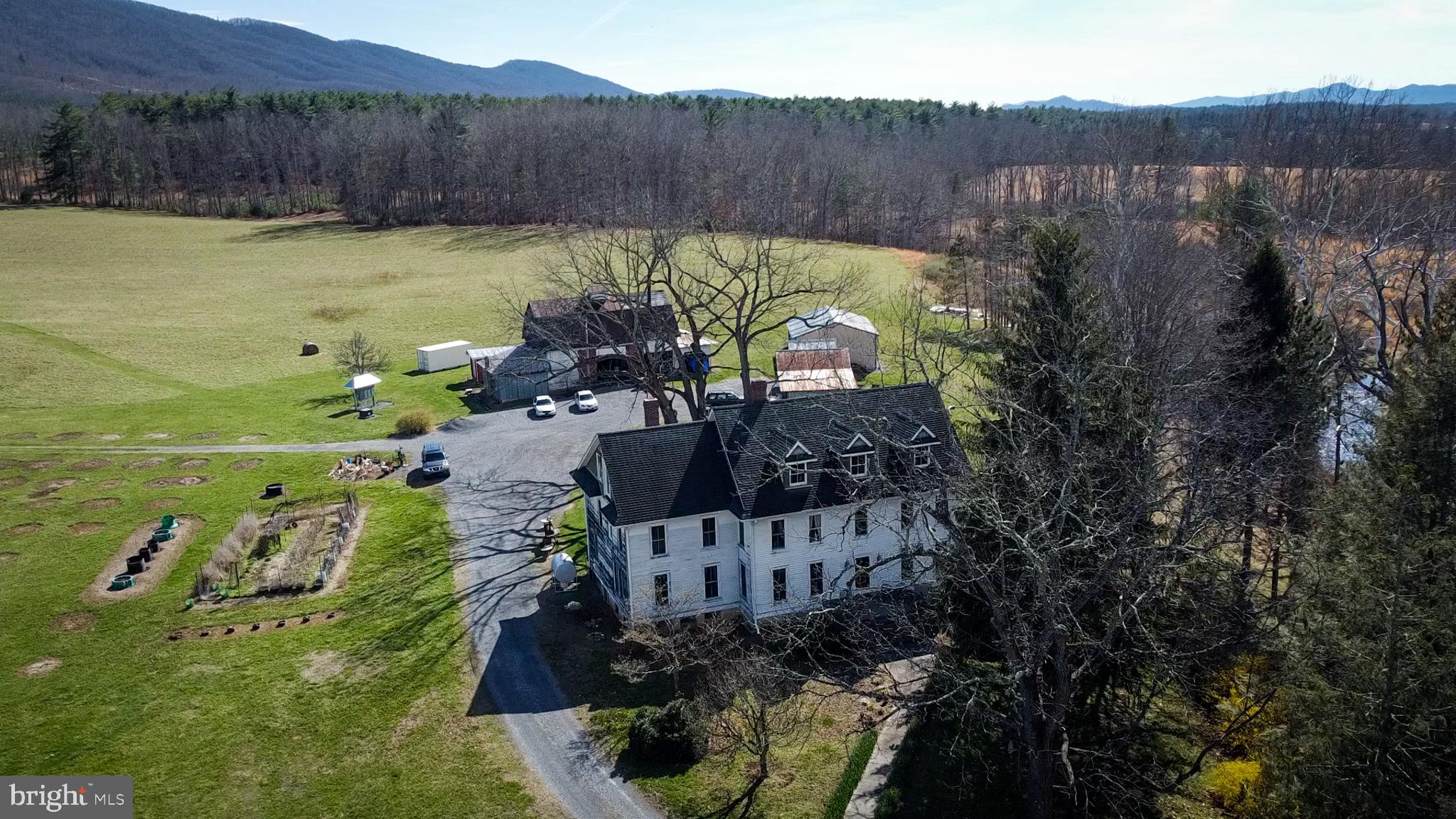 Rare opportunity to own a nearly 800-acre contiguous Blue Ridge mountain estate in Bath County, Virginia offering scale, privacy, and long-term land value in one of the region’s most desirable rural markets.
Jolly Farm features a historic 1914 farmhouse along with multiple supporting structures and a diverse landscape of rolling pasture, hardwood forest, mountain terrain, and natural water sources including a spring. The property includes internal access paths and a mix of open and wooded ground, supporting a variety of recreational and land use opportunities.
This is a legacy-scale holding designed for recreation, hunting, timber, conservation, or private multi-generational ownership.
 Shown by appointment only. Please do not drive by the property.