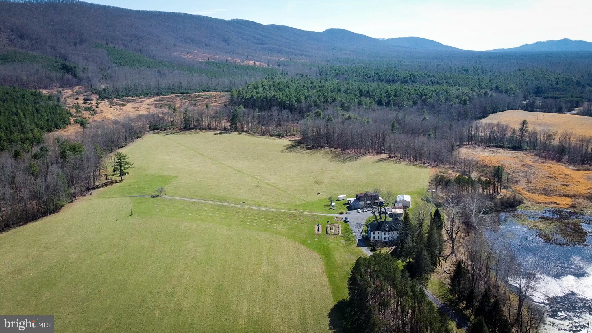 Rare opportunity to own a nearly 800-acre contiguous Blue Ridge mountain estate in Bath County, Virginia offering scale, privacy, and long-term land value in one of the region’s most desirable rural markets.
Jolly Farm features a historic 1914 farmhouse along with multiple supporting structures and a diverse landscape of rolling pasture, hardwood forest, mountain terrain, and natural water sources including a spring. The property includes internal access paths and a mix of open and wooded ground, supporting a variety of recreational and land use opportunities.
This is a legacy-scale holding designed for recreation, hunting, timber, conservation, or private multi-generational ownership.
 Shown by appointment only. Please do not drive by the property.