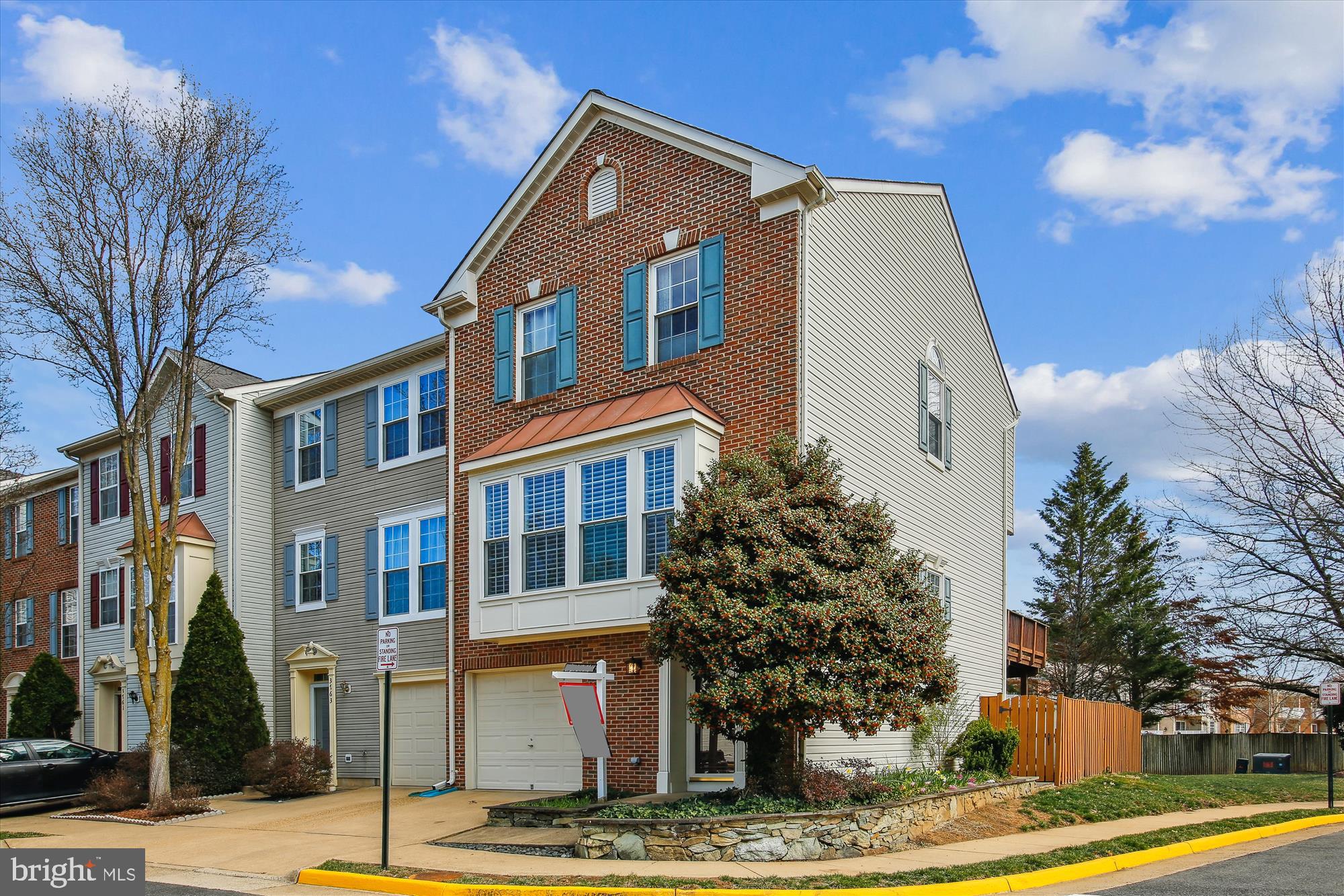 OPEN HOUSE CANCELLED *** ELEVATE YOUR LIFESTYLE  at this UPGRADED &  REMODELED 3-Level END  unit home featuring a 3-LEVEL BUMP-OUT and BRICK FRONT with double box bay window.  WOW,s  everywhere!  These are not your normal upgrades, but enhancements that show the owner has loved and cared for this home.  3 BRs, 2.5 BAs, 1 car garage - upgraded on all 3 levels!  ONE OF THE LARGER LOTS features a gated, fenced rear yard and extended side yard with a planting garden box and storage shed. The slate patio extends to a beautiful stone wall along the side of the home and continues to the front!     Abundant parking everywhere *** NEW 2025 carpet on the main and upper levels.  Touch-up paint * NEW 2021: 4" Plantation shutters on the entire main level * NEW 2019 ROOF & Extra insulation added in attic and sound insulation in the adjoining wall upper level * NEW 2018 Deck slider with built-in blinds.  Single Patio door with Palladian window & storm door * NEW 2017 Energy efficient double pane windows throughout * NEW 2016  VERY HIGH-END KITCHEN REMODEL - NEW 42” high-end cabinets featuring custom pull-outs, drawers for utensils & cookware, corner lazy Susan;  drawer customization includes trash/recycle, spice drawers, and more!  Any chef would be pleased in this Kitchen. * New CAMBRIA COUNTERTOPS and Décor backsplash * State-of-the-art appliances * New  Hardwood Flooring in the Kitchen and Family/Sunroom * Under cabinet lights * Under sink light * pull-down cookbook shelf *** Family/Sunroom off the Kitchen features a gas fireplace with Georgian Mantle &  marble surround.  Walk out from here to the DECK! *** Custom built-in entertainment center in main LR  featuring display shelves, drawers, and center TV nook * The Primary Suite boasts a vaulted ceiling, large walk-in closet with additional shelves behind door, ceiling fan, blackout shades, sound insulation in the adjoining wall and plenty of room for a KING BED &  furniture *  NEW 2012 PRIMARY BATH - Featuring LARGE walk-in shower with niches, Cabinets, Lighting & hardware, NEW porcelain flooring and travertine shower wall, Roman Shades: double window plus extra window for additional natural lighting, Pocket door added! *  NEW 2016 HALF BATH – cabinet lighting, ceramic floor, and wall + more * NEW  2016 HALL BATH - New cabinet, lighting, all ceramic in shower, niche, hardware, floor plus lighting * LOWER LEVEL RECREATION ROOM  is a full walk-out to enclosed rear yard/patio - standard door with Palladian window insert plus 3 additional windows.  Designer carpet. Plenty of room exists to create a personalized entertainment area or work center  *** Custom blinds, 4 ceiling fans * 3-piece Crown molding, and chair rail on the main level. 2-piece Crown molding & Wainscoting on lower level *  Vernon Heights Park is 1 block away.