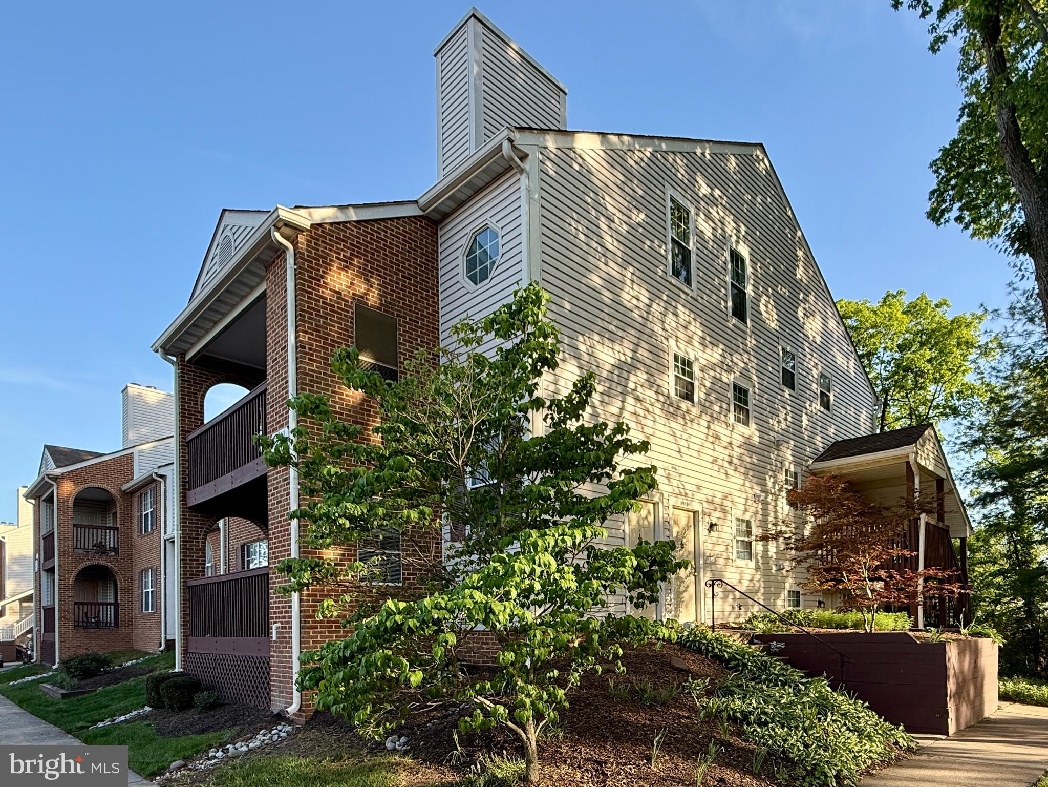 ***Back on the market due to no fault of sellers - Financing fell through*****Beautiful 2 bedroom/2 bath condo featuring over 1100 square feet in the Rollingwood community, just mins to Old Town Manassas and walking distance to the Prince William Medical Center!  This end-unit ground level property features privacy, no stairs, and lots of community green space and gardens for your enjoyment!  This home features LVP flooring, an updated kitchen w/ white cabinets and newer appliances, refreshed bathrooms, a large living room w/ cozy fireplace, separate dining room, in-unit washer/dryer, huge storage room behind the living room, and a private covered balcony that overlooks trees and more green space.  Assigned parking and just mins to the VRE make this a commuters dream!***THIS PROPERTY QUALIFIES FOR 100% FINANCING W/ NO MORTGAGE INSURANCE THROUGH THE HOMEBRIGHT PROGRAM!  ASK ME HOW!