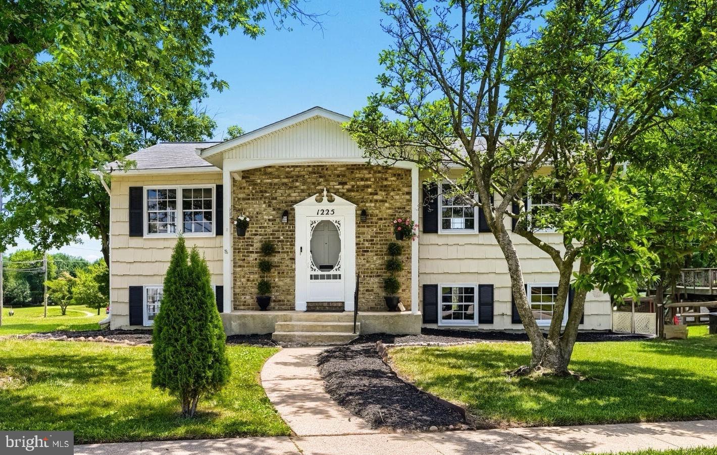 Welcome to this spacious 4-bedroom, 2.5-bath split foyer home located in the desirable Westview Park community of Catonsville. Offering over two levels of finished living space, this home provides the perfect combination of comfort, functionality, and outdoor enjoyment.

The main level features beautiful hardwood floors, a bright and inviting living room, a dedicated dining area, and updated kitchen featuring some brand-new appliances and ample counter space, opening seamlessly to the dining area —ideal for everyday living and entertaining. Three generously sized bedrooms and two full bathrooms complete the upper level.

The fully finished walkout lower level offers incredible flexibility: an additional bedroom and a half bath and an expansive recreation room featuring a built-in bar—perfect for movie nights, game days, a home office, guest suite, or multi-generational living.

Step outside to enjoy the large, fully fenced backyard complete with a large storage shed, and a spacious deck, providing plenty of room for entertaining, pets, gardening, or relaxing evenings outdoors. The home also features a dedicated electric vehicle (EV) charging station, making it easy to keep your vehicle charged and ready to go.

For added confidence, the seller is providing a roof certification along with an HVAC certification that includes a one-year service plan, giving buyers added peace of mind from day one.