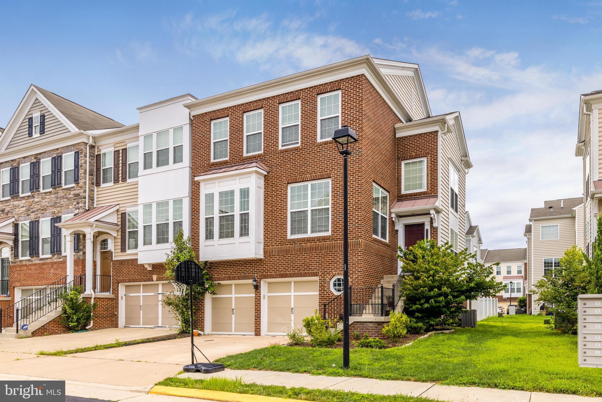 Available for occupancy on July 1st, possibly sooner.  4 bedrooms, 3.5 bathrooms, plus a MAIN LEVEL OFFICE. This expanded 3,389 sq ft end-unit townhome is in beautiful condition and features a large primary bedroom with a sitting room and a luxury bathroom, upstairs laundry, a wraparound composite deck, hardwood floors & staircases, and an oversized garage with a storage room. Natural light is abundant thanks to the additional end-unit windows. Upgrades to the living spaces, such as recessed lighting, high ceilings, and enhanced millwork, add a fine touch. Family amenities include a community pool, playgrounds, soccer fields, trails, walkable shopping, and blocks from the East Gate Metro connection. Close to route 50, 28, Dulles & I-66.  Rent includes trash service, snow removal, pool, and community spaces.  Pets are considered on a case-by-case basis.