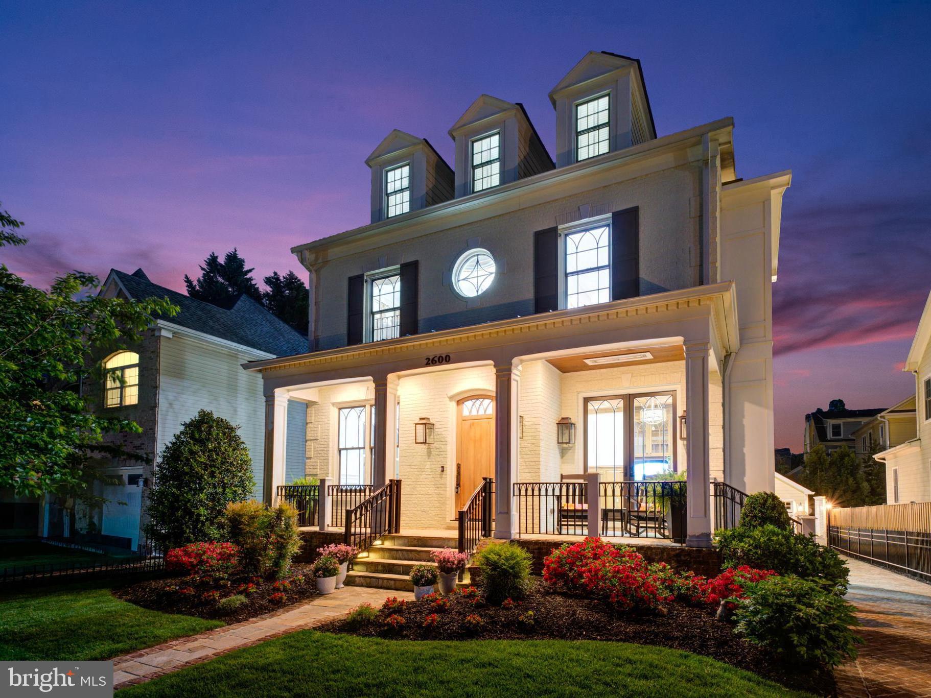 OPEN SUN 7/12 3-5 PM! Exquisitely crafted, custom-built 4-level luxury residence by BCN Homes in the heart of Clarendon! Perfectly designed for the discerning buyer who appreciates the fine craftmanship and a vibrant, walkable lifestyle, this exceptional home is just blocks to the Metro, grocery stores, upscale shopping, and the area’s finest dining.
This 5-bedroom, 5.5-bath residence showcases uncompromising quality, thoughtful design, and luxurious finishes throughout including solid Walnut Hardwood floors by Olde Savannah Floors, the handcrafted custom millwork and cabinetry by Graber Cabinetry, designer lighting fixtures and elegant coffered ceilings. Expansive custom windows by Norwood, accented with distinctive mullion designs, fill the home with natural light. Each bathroom is beautifully appointed with House of Rohl fixtures, hand-laid marble mosaic flooring & custom tile designs.
The gourmet kitchen is a true showstopper, featuring marble countertops, a 60” Wolf 6-burner range with dual ovens & grill top, Wolf steam oven, Sub-Zero Pro Series refrigerator, Bosch dishwashers, and a custom 60” solid copper range hood by Ventahood as well as in-wall auto-fill coffee maker, Scotsman ice maker, and InstaHot dispenser.
At the rear of the home, a stunning conservatory offers a tranquil yet sophisticated setting with a wood-burning fireplace, floor-to-ceiling windows, and distinctive herringbone-pattern brick flooring complete with a Perlick refrigerator with beer/wine tap system, and a wet bar with hammered bronze sink and marble surround, with direct access to the deck.
The open family room off the kitchen features a gas fireplace, built-in storage, and large windows that fill the space with natural light. An elegant dining room with a statement chandelier and tray ceiling enhances the home’s charm, while a private office or library with custom built-ins provides a refined work-from-home environment.
The primary suite offers a true retreat with his and her separate walk-in closets with custom cabinetry, Perlick beverage refrigerator, in-wall auto fill coffee maker and a spa-inspired bath with steam shower, free standing tub by Victoria & Albert, heated mosaic marble floors. Enjoy a private covered porch with fireplace, ceiling heater, and outdoor TV. 
The top level features an expansive, light-filled multipurpose space with soaring cathedral ceilings and ceiling fans, offering exceptional flexibility as an additional bedroom, yoga studio, home gym, or entertainment retreat. This level is fully equipped with a refrigerator, sink, hot water dispenser, dishwasher, custom built-ins, and a full bathroom. Skylights enhance the natural light, while abundant storage adds everyday functionality. Step outside to the rooftop veranda, where a custom stainless steel Diamond Spa hot tub with integrated sound system and a pergola create the ultimate private outdoor escape. 
An expansive lower level offers exceptional versatility, featuring a fifth bedroom, a full bath, a movie theater room, a wine cellar and a dog-wash area. The spacious rec room is fully equipped with a Sub-Zero refrigerator, Perlick refrigerator with tap system, sink w/marble surround, Bosch dishwasher, custom cabinetry and walk-up stairs with access to the backyard. Modern conveniences include dual-zone HVAC, Savant Smart Home system that unifies exterior/interior lighting, TVs and music, a Stealth speaker system, whole-house water filtration system, water softener, humidifier, generator backup and security system with cameras/motion detectors.  Outdoors, the property is equally impressive with a fully fenced yard and electronic gate, powder-coated aluminum fencing, authentic gas lanterns by Coppersmith, and a permeable brick driveway leading to a detached garage w/storage. Unbeatable location within walking distance from premier shopping, dining, parks & metro. Minutes to Georgetown, Washington DC, Pentagon & Airport.
