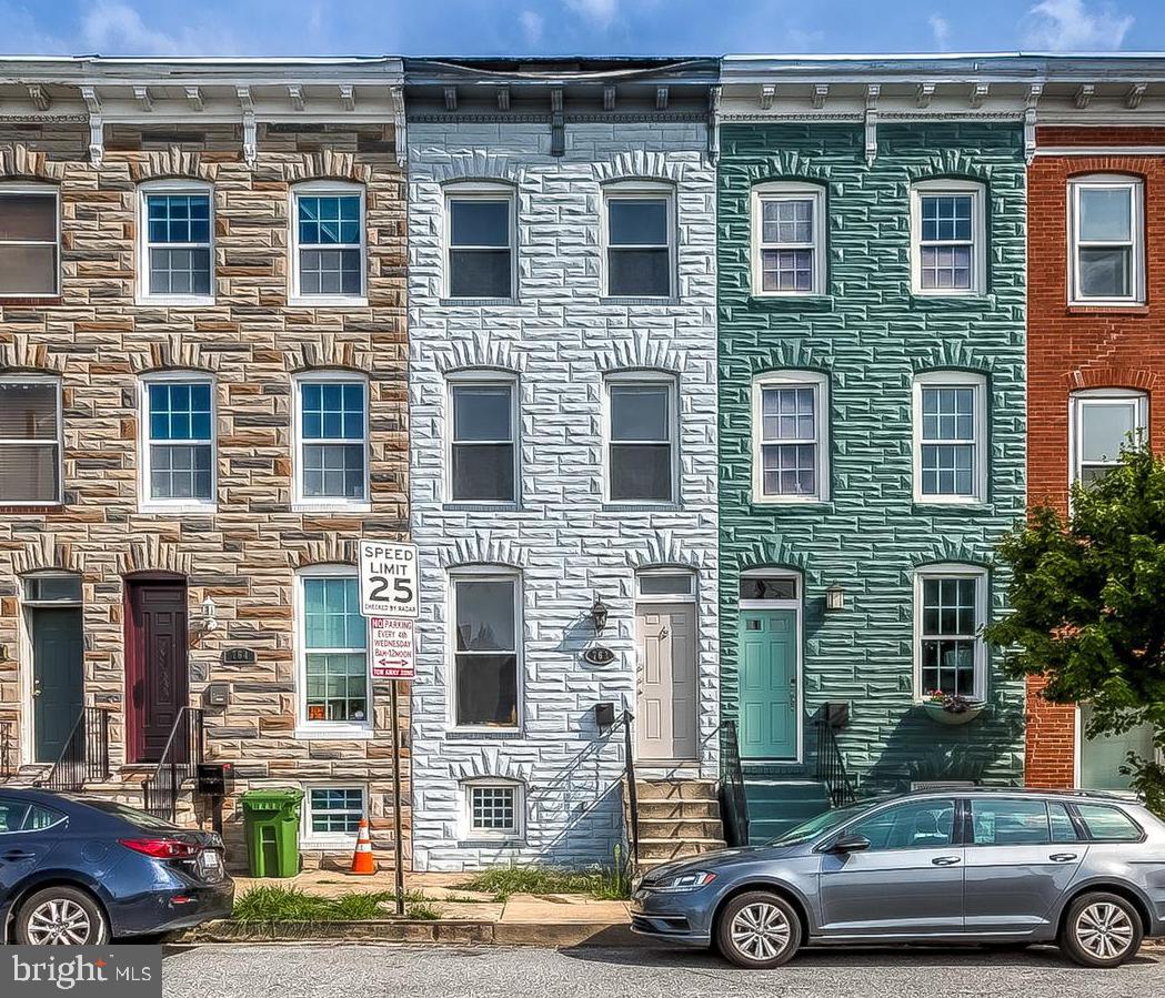 Newly refreshed, bright and airy, this Historic Barre Circle property could not be in a more CONVENIENT location for work and play downtown! Just MINUTES away from:  M&T Stadium; Orioles Park; Royal Farms Arena; UofMD Medical Campus & Biopark; Bromo Arts & Entertainment District; B&O Railway Museum and more!   With a brand new interior paint job and new carpeting throughout, this perfectly packaged home offers sun-filled rooms, Master Bedroom retreat , a large eat-in Kitchen w/ stainless appliances, separate Dining Room, Bedroom-level laundry and STUNNING views from the expansive roof deck which is perfect for social distancing! Plenty of space in the fenced, secure patio for your grill, bike and some planter boxes for some urban gardening!