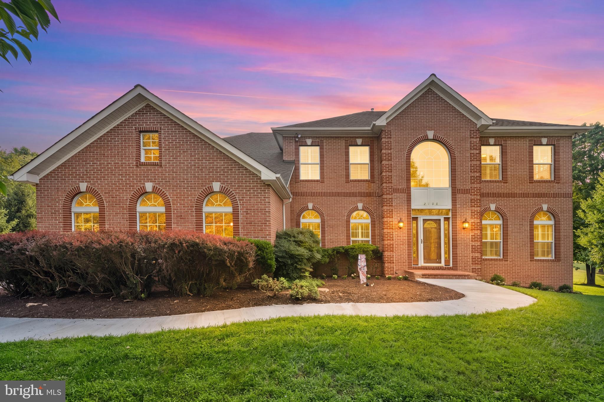 Welcome to this exceptional custom-built Brick Front Colonial in the highly desirable Gold Mine Crossing community of Brookeville. Situated on a breathtaking 3.92-acre lot and offering over 6,500 square feet of finished living space, this beautifully maintained residence combines luxury, comfort, and timeless elegance in a serene setting just minutes from shopping, dining, and commuter routes. A dramatic two-story foyer welcomes you into a spacious open floor plan featuring hardwood floors throughout the main level, formal living and dining rooms, a private office/library and mudroom. The recently renovated gourmet kitchen is the centerpiece of the home, showcasing granite countertops, custom cabinetry, stainless steel appliances,  dishwasher, a lighted beverage cooler, dual disposals, an oversized center island, and a sun-filled breakfast area. The adjoining sunroom opens to an expansive deck overlooking the picturesque rear grounds. Designed for both everyday living and entertaining, the home offers multiple gathering spaces, including a family room with a gas fireplace, a grand great room with a striking stone fireplace, and a wet bar. The second-level owner's suite provides a private retreat with peaceful views of the surrounding property.  You'll also find four additional spacious bedrooms, three full baths, a convenient laundry room, and updated flooring throughout the second floor.  The finished lower level is designed for both entertainment and everyday living, featuring a spacious gathering area with a kitchen, a private bathroom, a dedicated music room, an exercise room, and built-in storage shelving for added convenience and organization.  Additional highlights include Palladian windows, recessed lighting, ceiling fans, updated HVAC, water heater and roof, a three-car garage, and an extended driveway with ample parking. Enjoy the best of Brookeville living with nearby outdoor recreation at Rachel Carson Conservation Park and Mount Zion Local Park, offering miles of trails, playgrounds, pickleball courts, and open green space. Popular local destinations including Beer Farm at Brookeville, local farm markets, and the shops and restaurants of Olney are just minutes away, providing the perfect balance of peaceful country living and everyday convenience. This is a rare opportunity to own a one-of-a-kind estate property in one of Brookeville's most sought-after communities.