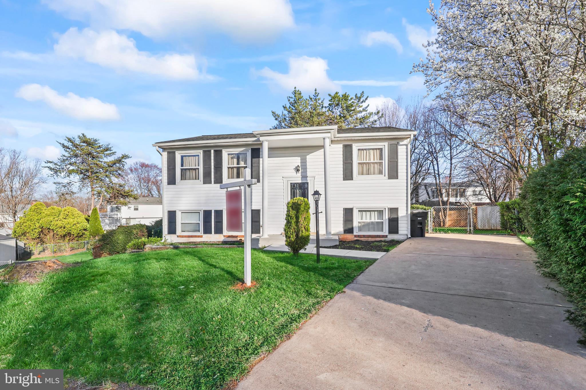 Beautifully Upgraded Split Foyer on a Quiet Cul-de-Sac! This charming home sits on a spacious .22-acre lot with an incredible backyard—perfect for ​pet  lovers, gardeners or just simply for entertaining! The extended driveway easily accommodates multiple vehicles. Inside, you'll find ​pristine hardwood floors throughout the main living area and neutral paint for a fresh, modern feel. T​he adjacent bedrooms are well sized and drenched in natural light and share a lovely upgraded full bathroom.  Downstairs, the remodeled lower-level kitchen  features granite countertops, stainless steel appliances, and a separate dining room. Down the hall, enjoy another upgraded full bath, a 4th bedroom, and a spacious recreation room with ​sliding glass doors leading to the impressive backyard.   ​Upgraded appointments include  ** Roof 2015/2016 **Updated Breaker and Electrical system updates** Water Heater 2024 ** Newer Washer and Dryer** HVAC 2024** Newer Gutters**.