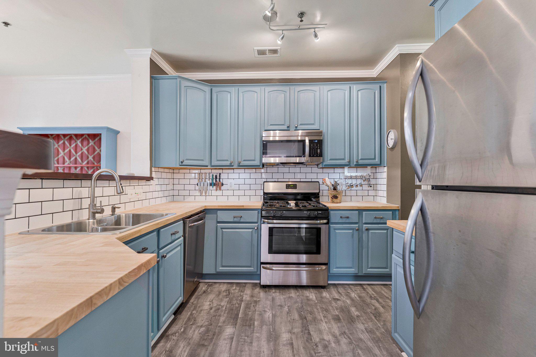 Welcome to Lorton Station living, where convenience and accessibility are at the center of everyday life. This spacious three-level condominium offers the feel of a townhouse with 3 bedrooms, 2.5 baths, and an attached one-car garage with private driveway parking.

The main level features a comfortable living and dining area, a convenient powder room, and a kitchen equipped with stainless steel appliances. Upstairs, you'll find three bedrooms and two full baths, while the upper-level loft/family room provides flexible space for a home office, workout area, tv room, playroom, or guest retreat.

Ideally located just minutes from the Lorton VRE Station, Lorton Town Center, shopping, restaurants, and the local library, this home also offers easy access to outdoor recreation at Pohick Bay Regional Park, Mason Neck State Park, and nearby walking and biking trails. Commuters will appreciate the convenient access to Route 1, Fairfax County Parkway, I-95, the Beltway, Fort Belvoir, and Washington, D.C.

A well-located home with space, flexibility, and easy access to everything Northern Virginia has to offer.