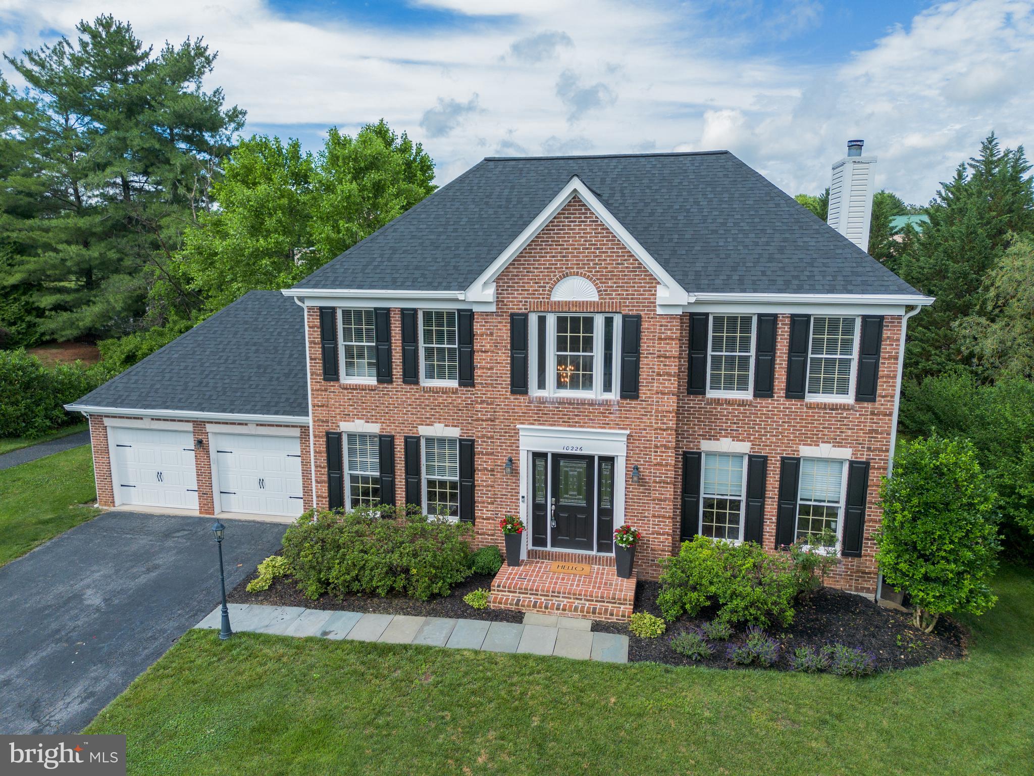 Welcome to 10226 Tarpley Court, where timeless elegance meets modern comfort in one of Ellicott City’s most sought-after communities. Nestled on a quiet cul-de-sac in the desirable Wetherburn neighborhood, this beautifully updated 4-bedroom, 3.5-bath residence offers the perfect combination of sophisticated upgrades, spacious living, and everyday convenience.  From the moment you step inside, you'll be captivated by the dramatic two-story foyer, flooded with natural light and setting the tone for the inviting spaces beyond. The main level is designed for ultimate flexibility, featuring a bright and spacious 4th bedroom complete with 2 windows and a dedicated closet. Positioned perfectly on the first floor, this versatile room easily doubles as a quiet home office, a main-level playroom, or private guest accommodations.  The heart of the home is the renovated kitchen, featuring gleaming quartz countertops, stainless steel appliances, and abundant workspace—perfect for everything from casual family meals to entertaining guests. Just beyond the kitchen, the warm and welcoming family room creates the ideal gathering space, highlighted by a cozy wood-burning fireplace that invites you to unwind on chilly evenings. Seamlessly blending indoor and outdoor living, sliding glass doors open to an expansive private deck surrounded by mature landscaping, offering a peaceful retreat for morning coffee, weekend barbecues, or dining al fresco under the stars. Whether hosting friends or enjoying a quiet evening at home, these thoughtfully connected living spaces create the perfect backdrop for making lasting memories.Thoughtfully refreshed throughout, this move-in-ready home boasts fresh paint, brand-new luxury vinyl plank flooring across the entire upper level and basement, a new HVAC system (2025), and a brand-new roof, providing both style and peace of mind for years to come. Upstairs, the luxurious primary suite offers a true retreat, complete with a spacious walk-in closet and a spa-inspired bath designed for relaxation and rejuvenation. You will also find two additional large bedrooms and a second full bath on this level, along with the ultimate convenience of an upper-level laundry room.The expansive finished lower level expands your living area even further, offering an incredible footprint that can easily accommodate a fitness center, media room, recreation area, or hobby space. With an additional full bath already in place, this lower level offers endless configurations to fit your lifestyle.  Step outside and discover the charm that makes Wetherburn so beloved—tree-lined streets, sidewalks, and a welcoming community atmosphere. Enjoy the tranquility of suburban living while remaining just minutes from top-rated Howard County schools (including Marriotts Ridge High), parks, shopping, dining, Historic Ellicott City, and major commuter routes, making travel to Baltimore, Washington, and surrounding areas effortless.  Beautifully updated, meticulously maintained, and ideally located, 10226 Tarpley Court presents a rare opportunity to own a truly turnkey home in the heart of Ellicott City. This is more than a house—it’s the lifestyle you've been waiting for.