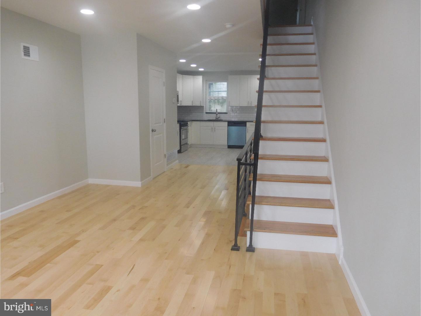Pretty rehab in the Point Breeze/ Newbold area of South Philly. First floor living room /dining room combo, with hardwood flooring, recessed  lighting and a  powder room. Eat in kitchen with beautiful cabinets, granite counter tops,tile floor, tile back splash and stainless steel appliances including, dishwasher, refrigerator,gas range and microwave oven. Second floor has 3 bedrooms ,with recessed lighting and hardwood flooring with lots of closet space. The bathroom is a nice size with a tiled tub surround. The basement is finished with a laundry area, and tile floor. High Efficiency HVAC system, electric water heater, new electrical system. The gas service is new.