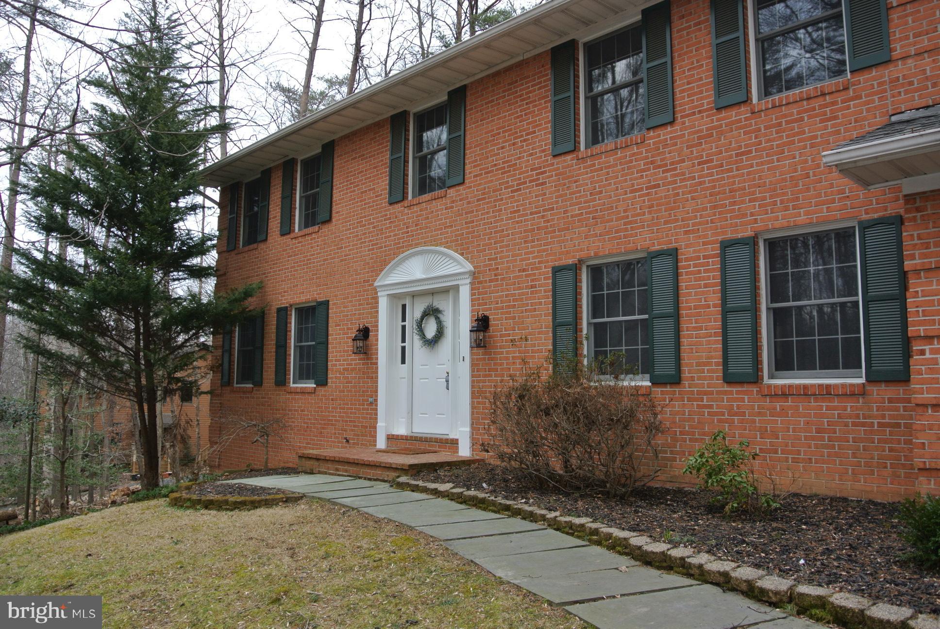 Amazing wooded views, private natural setting with convenient location.    This beautiful center hall brick colonial!  Home is  updated & appointed w/ tasteful decor. Fresh paint,  recent roof & driveway are a few of the important attributes that make this home an incredible value. Location remains the most important asset for buyers and this home is perfectly sited minutes from shopping, dining, hike and bike trails, schools & much more. SPRING IS COMING!