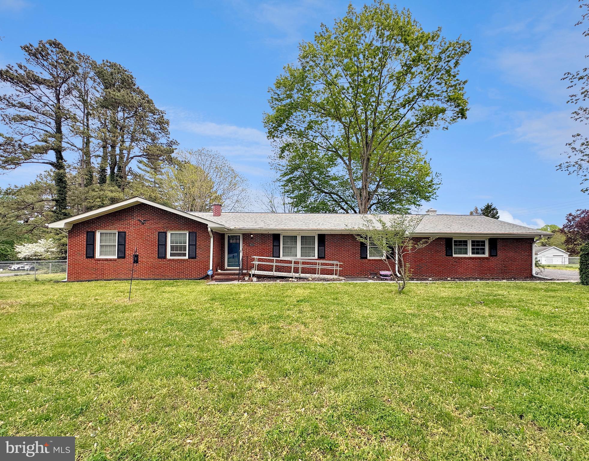 BACK ON THE MARKET!! AT NO FAULT OF SELLER. Now’s your chance! Welcome to 8221 Hickory Dr, where charm meets convenience and one-level living never looked so good. This beautifully updated all-brick rambler sits on nearly an acre of peaceful, tree lined property with a fully fenced backyard and absolutely no HOA. From the moment you step inside, you’ll notice the difference. Brand new LVP flooring and updated light fixtures flow throughout, giving the home a fresh, modern feel while keeping its warm, inviting character. The layout strikes the perfect balance; a spacious living room, formal dining room, mudroom off of garage and a dedicated home office. At the heart of it all is the showstopper country kitchen fully remodeled with new cabinetry, butcher block countertops, stainless steel appliances, black hardware, recessed lighting, a center island, and coffee bar.
Three generously sized bedrooms and two beautifully updated full bathrooms complete the main level, while a convenient half bath is tucked inside the oversized two-car attached garage. Need a space to create, build, or tinker? The detached one-car workshop with electric and a wood stove is ready for whatever you have in mind. An unfinished basement adds even more potential for storage or future expansion.
The big-ticket items are already done! ALL NEW PLUMBING, HVAC 2022, and ROOF 2022 so you can move in with total peace of mind.
All of this, within walking distance to the community pool and just minutes from Dahlgren Naval Base, the 301 Bridge, Fredericksburg, and the VRE with an easy commute to both DC and Richmond. Country feel, unbeatable location.