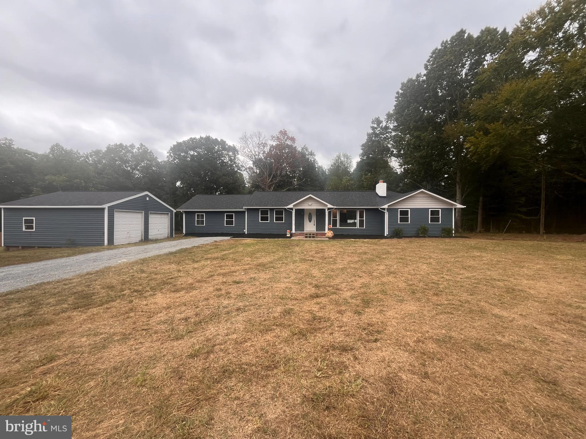 BACK ON MARKET. NO FAULT TO SELLER THE BUYER FAILED TO PERFORM. MOTIVATED SELLER. SELLER WILL GIVE $25,000 SELLER CREDIT TO BUYER. LOOKING FOR A QUICK CLOSE. Welcome home! Grab your piece of paradise today. This is basically a new house; from the foundation to the roof, everything is new. Get country living with the convenience of the city. Want the peace and serenity of nature, want the feel of seclusion but still close to everything? Well look no further!

This stunning 5-bedroom, 2-bathroom one-level ranch is what you have been looking for. With an over-sized 2-car garage and massive driveway, you can fit 100 cars! Located in beautiful Orange County, nestled on nearly 3 acres with no HOA, the opportunities are endless. Want a pool, basketball court, or farm? You have the space for it. You are 10 minutes to Walmart and Food Lion and about 30 minutes to Home Depot & Central Park. With every inch being renovated, this single-family home has an open concept layout, a large kitchen with Quartz counter-tops, new LVP flooring, and fresh paint throughout. It also features a big laundry room with a stack-able washer and dryer. The lovely covered deck off the kitchen gives you the inside-outside living that has become so popular. We cant forget about the wood burning fireplace that gives that warm cozy feel and ties the entire house together. This is single-level living at its finest!