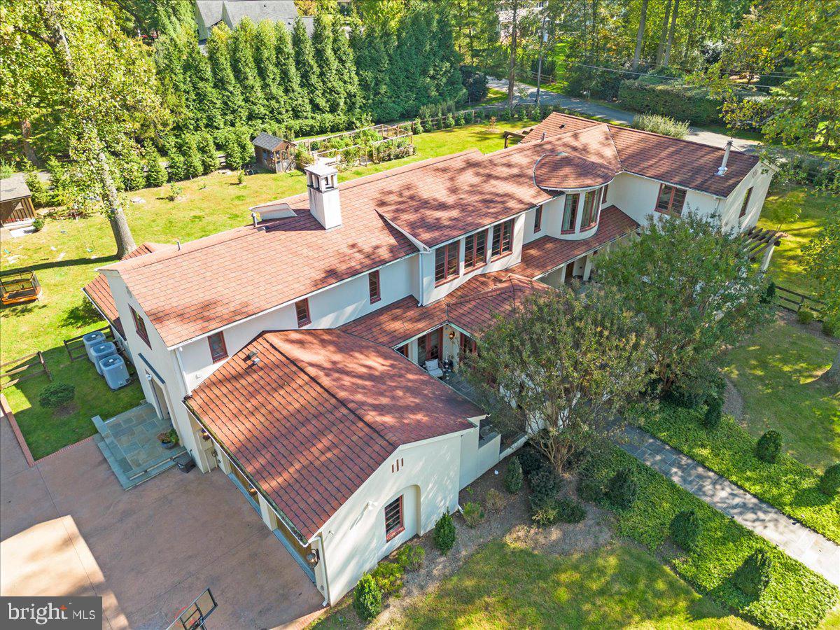 Exquisite architecture and contemporary luxury come together at this stunning Great Falls Estate. This unique and move-in-ready residence is located on a tranquil, no-through street and resides on a rarely available 1-acre lot with 8,561 sq ft of gorgeous living space with 7 legal bedrooms and 5 1/2 baths. This exquisite architect's custom-built residence exemplifies a commitment to premium craftsmanship, evident in its high-quality assemblies, finishes, and fixtures. The home offers a sense of seclusion with its entry courtyard and access to four exterior terraces. This home features luxurious details both inside and out. 

As you enter this home you will be instantly stunned by the 2-story custom entryway and  premium flooring. An elegant dining area that can host large or quaint dinners. The windows and French doors feature insulating glass and architecturally accurate simulated divided lite muntin bars. Climate control is achieved through a highly efficient three-zone Carrier Infinity mechanical system.

The first and second floors boast stunning stained walnut flooring, complemented by extensive multi-piece architectural moldings. The Study area is adorned with vertical grain pine trim and built-in cabinetry. Numerous rooms are thoughtfully wired for audio, video, telephone, and network connections.

 The heart of this home lies in its gourmet kitchen, a haven for culinary enthusiasts, equipped with top-of-the-line appliances, ample counter space, and custom cabinetry. The gourmet kitchen showcases custom wood cabinetry, granite countertops, and a suite of top-tier appliances, including a 48” Viking range, 36” Subzero refrigerator, 27” Subzero under-counter freezer drawers, two Miele dishwashers, and a Sharp drawer-style microwave oven.

The bathrooms are elegantly appointed with high-quality ceramic or stone tiling, granite countertops, and premium plumbing fittings. Recessed lighting, under-cabinet task lighting, and a variety of distinctive wall and ceiling-mounted fixtures illuminate the interior.

Nestled in a neighborhood within close proximity to the Village for convenient shopping and dining, hiking at Seneca Regional Park this Mediterranean-style home benefits from paved roads that invite outdoor activities. It is zoned for the prestigious Langley School District. With a well-designed floor plan featuring 7 legal bedrooms and 5 1/2 baths, including exercise room this home rests on a generous one-acre lot at the end of a tranquil street. 

Don't miss the opportunity to call this remarkable estate your own, where every detail has been carefully crafted to provide you with the ultimate luxury yet cozy living experience.