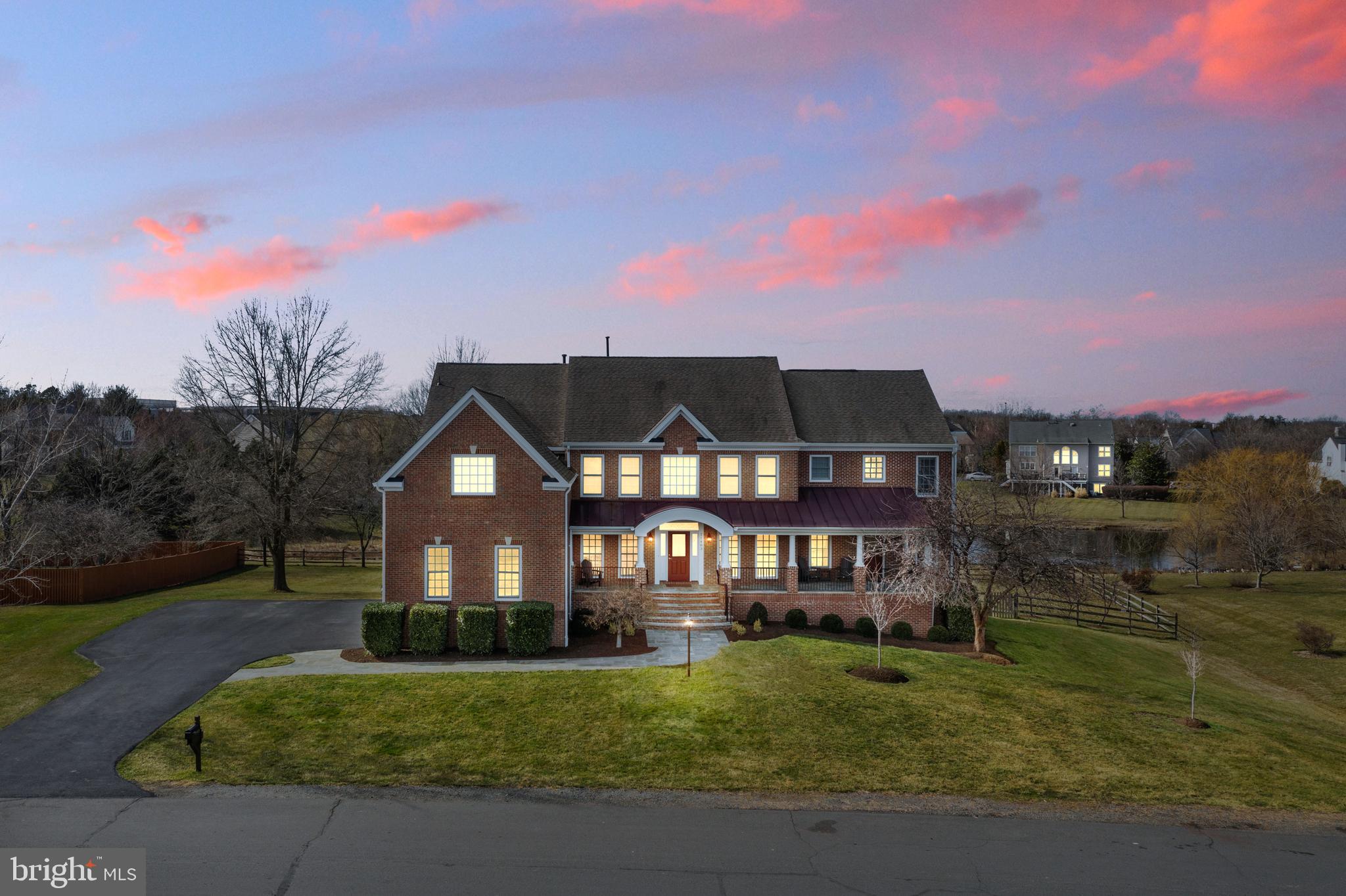 Incredible unique estate home! Over 7,000 finished sq ft! Large 3/4 acre lot backs to pond! Main level includes tiger-wood hardwood floors! Renovated gourmet kitchen with upgraded stainless appliances! Laundry room & spacious pantry! Cooking island plus breakfast area! Step-down family room w/gas fireplace.  French doors to rear deck! Unbelievable addition includes large office, kitchen, dining area, bedroom plus full bath--perfect for multigenerational living! Main level includes a second full bath too!  Primary suite includes expanded bedroom, spacious walk in closets and totally renovated spa bath!  Upper level includes 4 secondary bedrooms with 4 full baths!  Enjoy the game room with wet bar and family room area for relaxing!   Second upper level serves as another office or hobby area.  Lower level of addition includes another rec room, bedroom and full bath.  Unfinished basement includes another partially finished room which  could be a workshop.  Enjoy the stone patio, perfect for watching the sun set! Four zone HVAC, 2 water heaters, irrigation system,  windows replaced Anderson brand, exterior trim replaced with PVC wood-look material  ..This house has so much!