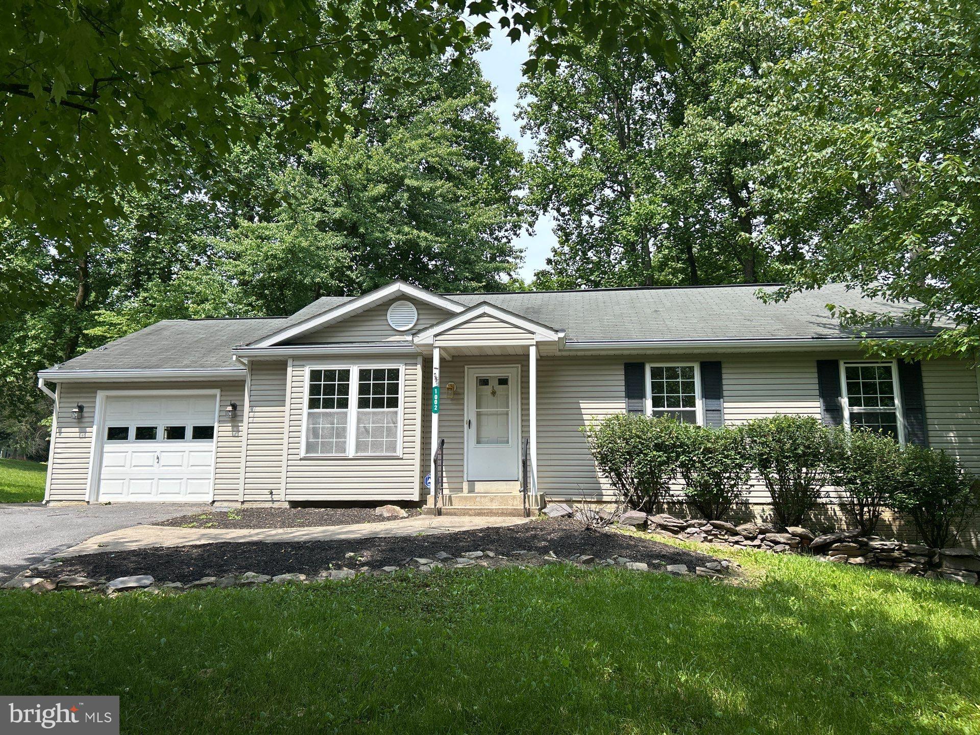 3Bd/2,5Ba rancher.  Vinyl siding, asphalt single roof, 1 car attached garage and covered rear deck.Freshly painted throughout. First floor has a livingrm with electric frpl, eat in kitchen, 2Bd and 1.5 baths.  Finished lower level with 3rd bedroom, full bath, possible office and family room. Conv. to shopping and Rt 70