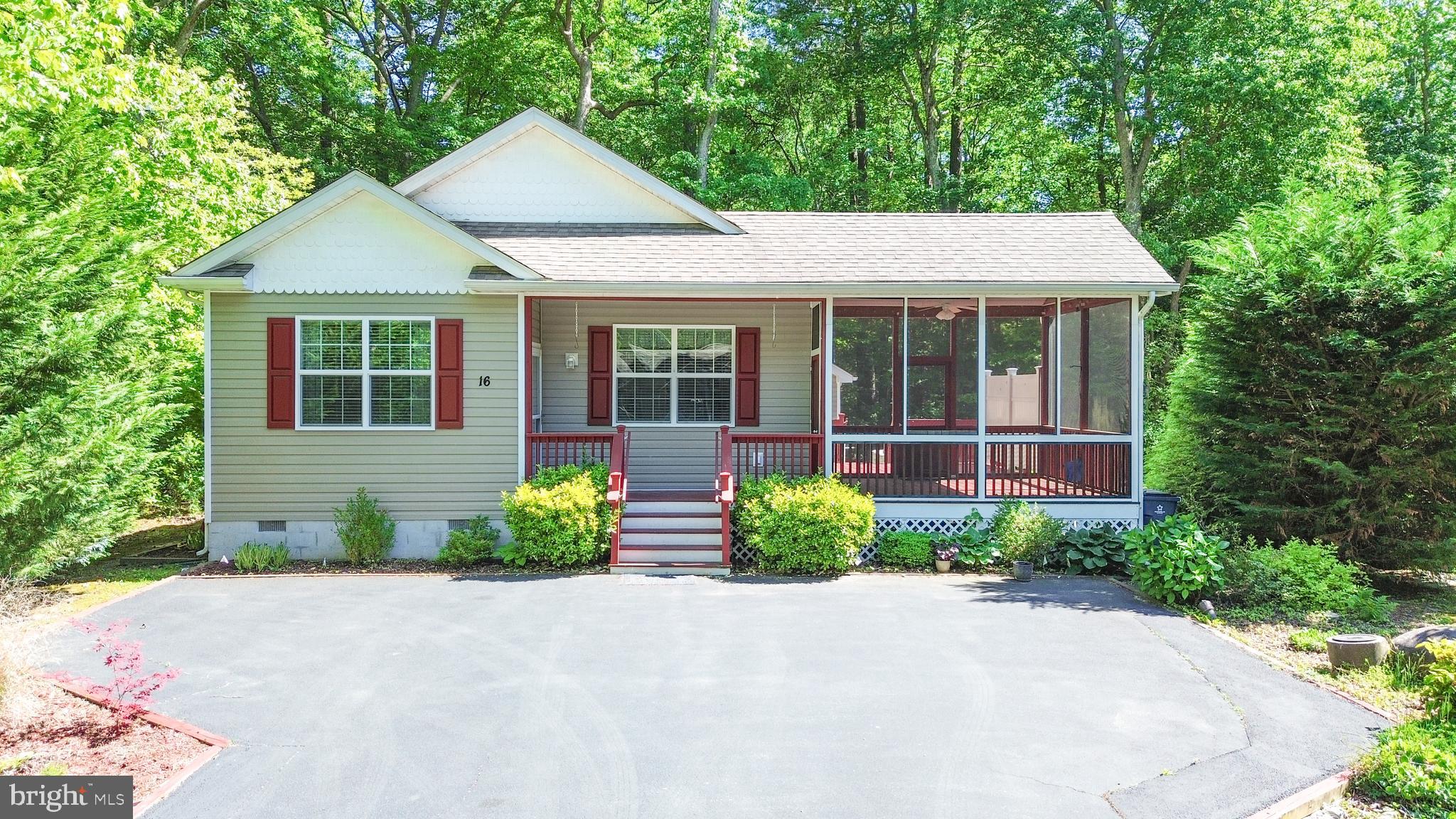 Charming 3 bedroom, 2 bath home nestled on a quiet cul-de-sac in the desirable Ocean Pines community. Offering 1,300 sq ft of living space, this well-maintained property features a comfortable and functional layout ideal for year-round living or a coastal getaway. The home includes a bright kitchen with a convenient center island and a spacious pantry, providing ample storage and workspace. A separate laundry room adds everyday convenience. Enjoy relaxing evenings on the screened porch or entertain guests on the outdoor deck overlooking a private backyard - perfect for barbecues and outdoor gatherings. Additional highlights include three storage areas, one attached to the house. The other two are free standing, all ideal for beach gear, bikes, or kayaks. The hard surface driveway provided plenty of parking and can accommodate at least 3 vehicles. Located just minutes from Ocean City, Ocean Pines is one of the Eastern Shore’s most sought-after communities, offering a unique blend of nature, waterfront living, and resort-style amenities. Residents enjoy: swimming pools (including indoor & beach club pool), yacht club and waterfront dining, 2 marinas with boating access, tennis and pickleball court, walking and biking trails, multiple parks, community center, farmers market and year-round events. Seller is offering a one year American Home Warranty at closing. One outdoor shed is attached to the home. Another wooden shed is free standing in the back yard and a third shed is to it's left. The Hot Tub is included in the sale -- it has not been used for the last three years.