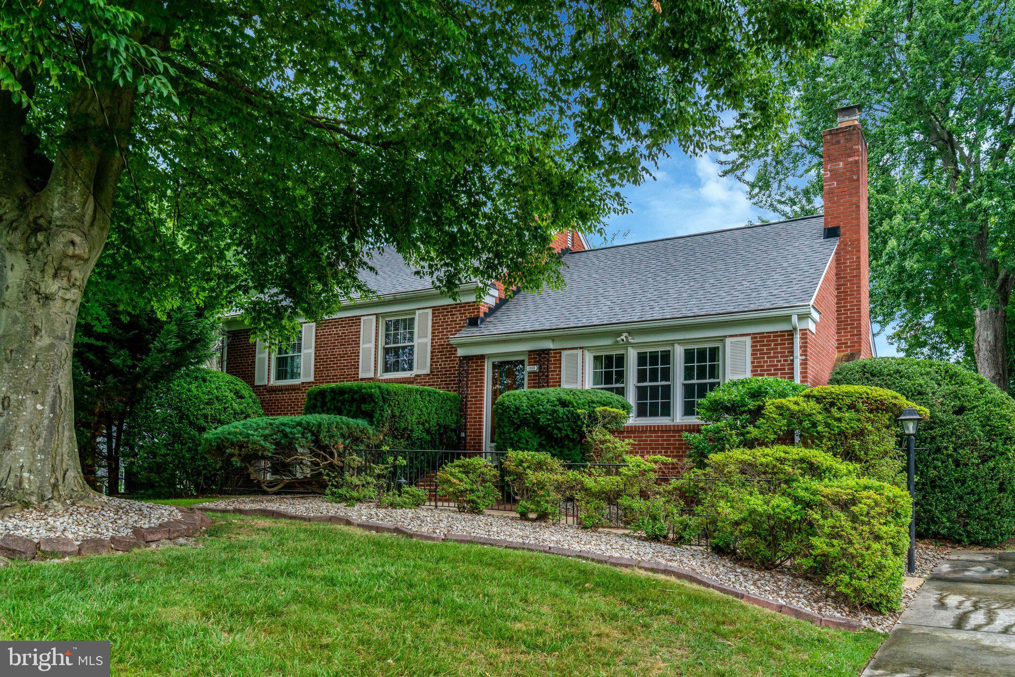 "What a lovely home!"  "Tucked away back yard and yet super convenient location!" are comments about this Midcentury Classic Split-Level home, located in convenient Annandale, VA!  Welcome to Cedar Crest.   With a NoVA location that can't be beat, this Split-Level floor plan includes 4 bedrooms, 2.5 bathrooms, 4 fully finished levels + a finished walk-up attic, gas-insert fireplace, spacious rear patio, fully fenced back yard, driveway for 3 cars, 2 storage sheds, a whole-house backup power generator, all nestled on a manicured lot with mature trees and shrubs.   While this home may look modest as you drive by, this floor plan will wow you with plenty of living space and built-in storage galore!  An updated Kitchen has granite counters, stainless steel appliances, plenty of storage, table space, and a large bump-out window overlooking the bright and sunny backyard area.   3 spacious bedrooms + 2 Full bathrooms on upper bedroom level plus 1 top level bedroom makes for perfect overflow space or an office area.   The inviting Main entry level greets you with an updated Kitchen including stainless steel appliances, granite counters and wood cabinets; a spacious Living Room with large picture windows, a classic wood mantle over a gas-insert fireplace, wood-paneling accent wall and a connected formal Dining Room with back door access to a tiled patio area making this entire level a perfect layout for entertaining or quiet times inside or alfresco dining outdoors.  The Lower-level Rec Room is where the party will be!  Fully finished with paneled walls, built-in shelving, above-grade windows, cable/internet wire ready, and a full custom free-standing bar that seats 4 and ready for mocktails or cocktails, game nights or movie dates.  Laundry Room has a full size washer & dryer, utility sink and attached ½ bathroom.  The utility work room with built-in storage and work bench, an extra refrigerator and a free-standing freezer (both convey) max out this storage space.  Rear exterior door to the back yard makes it super convenient to head outside. Fully finished top-level attic is perfect with built-in closets to store seasonal decor or whatever you need!  Other sought-after home features include original parquet and hardwood flooring on the main and upper bedroom levels, custom window treatments and blinds throughout, trendy wallpaper in bedrooms and bathrooms, wood wall paneling, built-in shelving, and a bathroom on most levels.  House details include a Shiner-brand Roof (2025), replaced windows and storm doors, whole-house backup power generator with updated electric service panel, gas HVAC and gas water heater both with service contracts, and an annual lawn maintenance contract.   All this AND “location, location, location” being only 2 stoplights away from I-495 Beltway, Braddock Road, and Little River Turnpike for major commuter route access.   Fairfax County schools and services.   NO HOA.  Professionally cleaned carpeting (06/2026) on lower level.   Property is an estate sale sold strictly “As-Is” and in very good condition.  Professional photos, floor plans, marketing brochure, MLS disclosures, and offer guidelines available online.  Move in NOW or take time to update.  Either option makes this gem is the one not to miss!  Estate reserves the right to set an offer deadline and ratify on a sales offer at any time.  Don't think about this home for too long or you may miss out!  Welcome home!