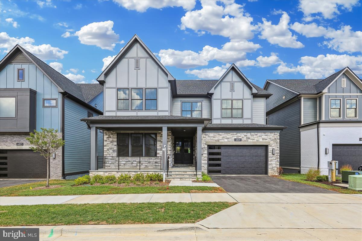 Fantastic TriPointe home in the Amalyn neighborhood! Stunning details and finishes that are for the most discerning resident.  This home features hardwoods on main and upper levels, 8' solid wood doors, gas fireplace, main level office. A screened porch with steps to backyard is off of the kitchen. Lower level is also a walk out with an over 12' long wet bar! Upstairs the PRBR is kingsized with 2 walkin closets (completed with custom cabinetry), a tub and shower with 2 shower heads! 3 additional bedrooms and den area, and laundry room are upstairs.