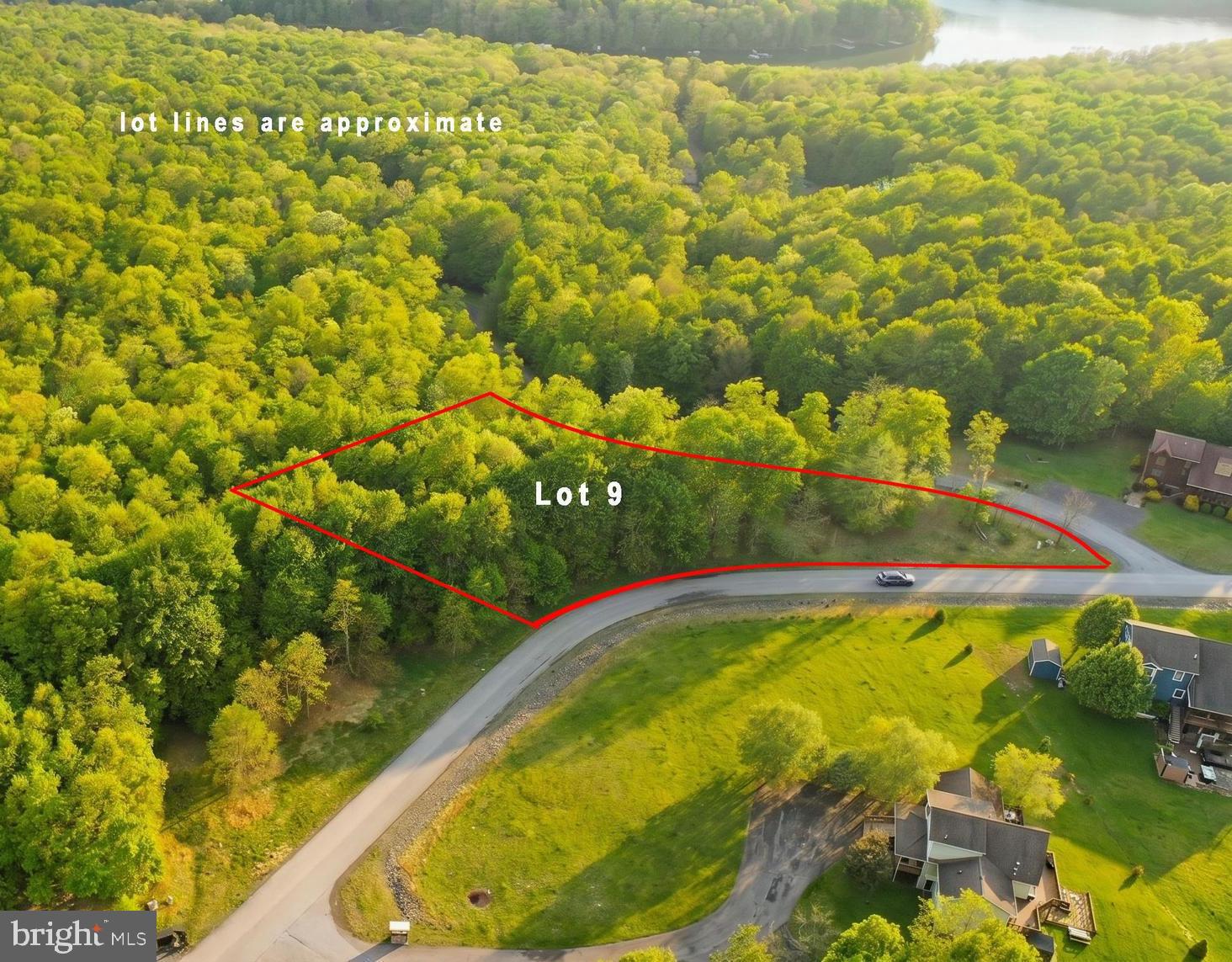 2.08 acre corner building lot in The View community at Deep Creek Lake! The lot is approved for up to a 6 bedroom septic system - a rare find which offers added flexibility for your future mountain or lake area home. Mostly wooded setting with convenient access off Lakeshore Drive and close proximity to Deep Creek Lake, Wisp Resort, restaurants, shopping, and local attractions. Lot 10 is also available offering 2.6 acres. If purchased together, this allowed for a total of 4.68 acres of contiguous property. Don't miss your opportunity, call today for more information!