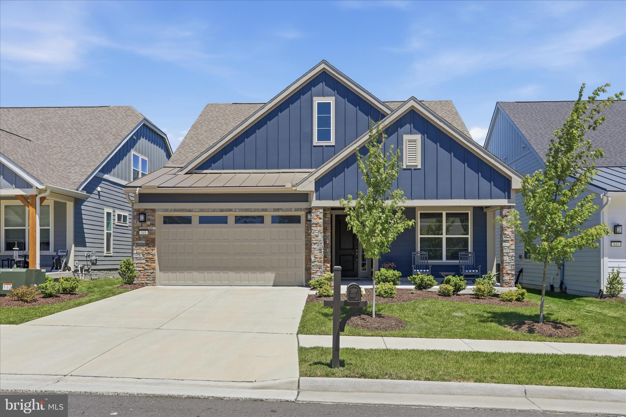 Welcome home to this stunning, recently constructed Craftsman-style residence perfectly situated in the vibrant and highly sought-after community of Lake Frederick! Offering the convenience of one-level living, this beautifully designed home combines modern elegance with everyday comfort. From the moment you arrive, you’ll notice the impeccable exterior including durable Hardie Plank siding, charming curb appeal, and beautifully maintained landscaping. Step inside to discover attractive hardwood floors, soaring ceilings, and an open-concept floor plan filled with natural light. The gourmet kitchen is truly a chef’s dream, featuring gleaming quartz countertops, subway tile,  stylish cabinetry, and top-of-the-line stainless steel appliances, including a double convection oven. Entertain with ease at the custom-built bar, recently added for the perfect touch of sophistication, or unwind with a cocktail or glass of wine on the screened porch or newly added hardscaped patio. Just outside your doorstep, enjoy resort-style community amenities including a stunning pool with heated, indoor, and saltwater options for year-round enjoyment. The beautifully maintained grounds encourage leisurely walks and social connections, creating a true sense of community. This is more than just a home—it’s a lifestyle. Experience the perfect blend of luxury, comfort, and relaxed living in Lake Frederick. Your dream home awaits—don’t let it slip away.