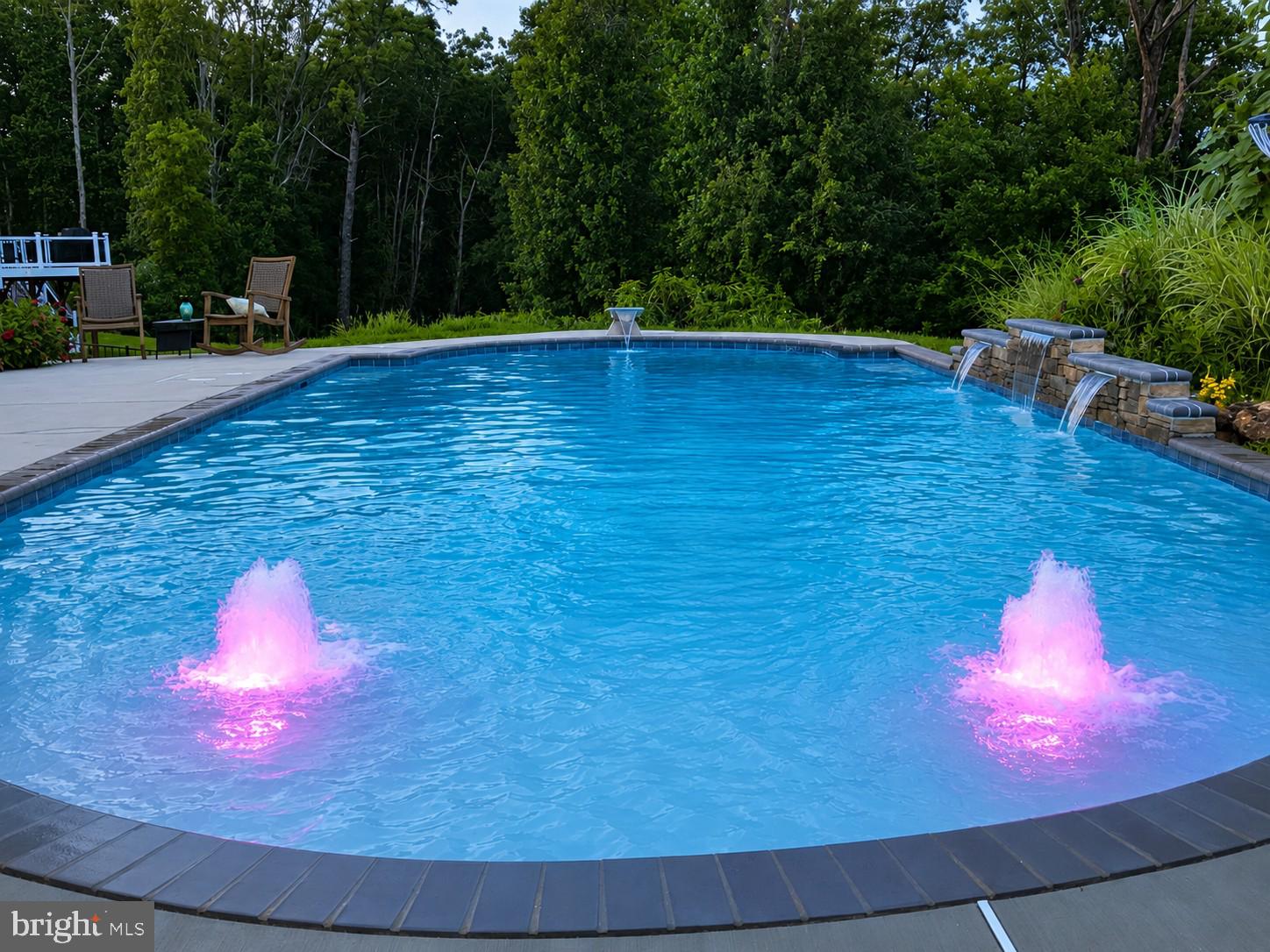 ********Coming Soon******** Professional Photos will be uploaded 7/14!!
Tucked in the center of a quiet cul-de-sac on a private road, this exceptional 4-bedroom, 3.5-bath Colonial offers the perfect blend of privacy, space, and community.
 The backyard is the showstopper! Backing to protected woodlands, the fully fenced yard feels like your own private retreat!  The resort-style pool, resurfaced in 2024, features a waterfall, diving board, tanning ledge, colorful bubblers, and a state-of-the-art in-floor cleaning system that eliminates the need for vacuuming. It's an outdoor space built for unforgettable gatherings and everyday relaxation.
 Inside, the sun-filled kitchen overlooks the pool through a beautiful bay window... perfect for morning coffee. The finished basement adds exceptional flexibility with a full bath, bonus room for guests or a home office and abundant storage. Upstairs, the spacious primary suite offers a peaceful escape with a soaking tub and separate shower. Energy-efficient windows and doors, a 2-car garage with ample storage, and an oversized driveway for up to 8 vehicles to complete the package.
 What truly sets this home apart is the spectacular sunsets!  This is more than a house........ it's a place where lifelong memories are made.