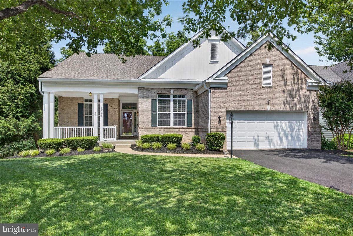 This is the one you have been waiting for.. On one of Dunbarton's most private and scenic homesites sits this impressive 4 bedroom, 3 full bath home offering over 4,000 square feet of open concept with a thoughtfully designed layout and tasteful features and upgrade. Perched above the Bull Run stream corridor, this meticulously maintained property offers a rare combination of wooded views and exceptional privacy.  As you walk into the home you are met with soaring ceilings, recently refinished hardwood floors,  spacious main-level primary suite and an inviting family room with a gas fireplace. The finished walkout lower level showcases plenty of flexible space for guests, hobbies, entertaining and storage. Home improvements include fresh interior paint, refinished natural hardwood floors, modernized kitchen with top of the line stainless steel appliances, built in speakers, whole house water filtration system, and more! Gated community with plentiful amenities offering incredible lifestyle and social amenities including indoor pool, fitness center, tennis & pickle ball courts, and bocce ball!  Picture yourself enjoy your beverage from the upper deck while overlooking protected natural surroundings that create a peaceful retreat just minutes from shopping, dining, and major commuter routes.  Welcome home :)