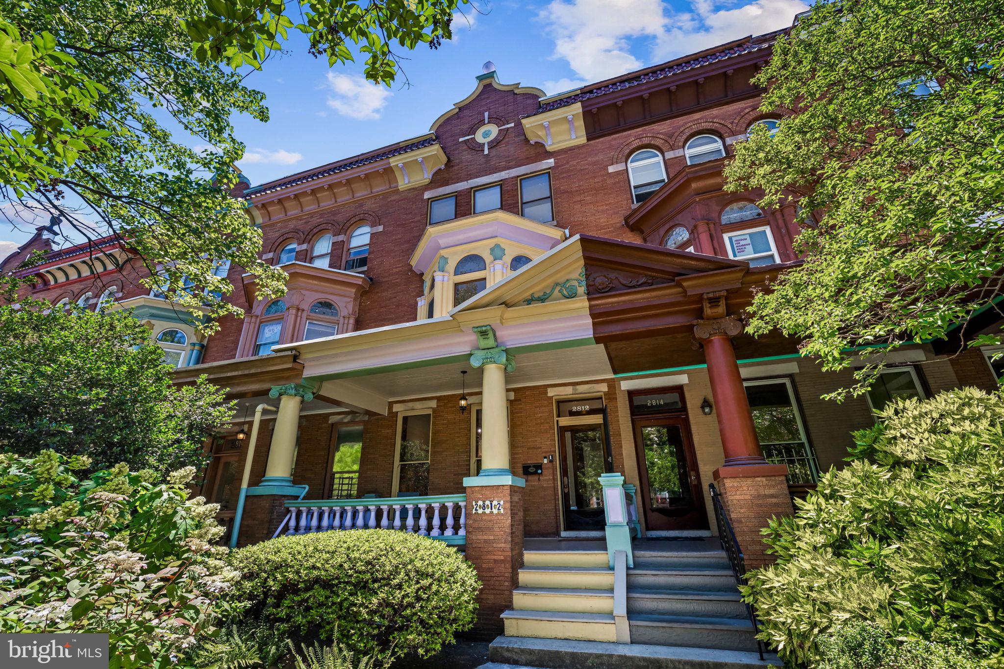 An exceptional offering of one of Charles Village's grand Painted Ladies, this distinguished residence stands as a testament to timeless architecture, remarkable craftsmanship, and generations of thoughtful stewardship. Lovingly preserved, the home is rich in historic character, showcasing soaring ceilings, exquisite original woodwork, mahogany inlaid hardwood floors, a dramatic three-story atrium, brick reclaimed from the aftermath of the Great Baltimore Fire, original transoms above the interior doors, pocket doors, original tin ceilings, and beautifully preserved fireplace mantels with their original decorative tile surrounds. Every room reflects an unwavering commitment to preserving the home's architectural integrity while creating spaces that are both inspiring and livable. Framed by picturesque cathedral views and a tranquil garden, the home enjoys one of Charles Village's most beautiful settings.

Thoughtfully adapted for modern living while honoring its historic soul, the home offers three bedrooms, two full and one half baths, an inviting upper-level family room, and dedicated office and study spaces that provide exceptional flexibility for work, creativity, or quiet retreat. The lower level is intentionally designed for everyday function, offering abundant storage, a workshop area, laundry, and the practical utility that graciously supports the living spaces above. A welcoming front porch introduces the home, while the enchanting rear garden provides a private urban oasis with a screened porch, grapevine-covered pergola, mature fig tree, and lush landscaping. Completing this exceptional offering is the rare convenience of a detached garage for off-street parking.

Situated on one of Charles Village's most coveted blocks, this remarkable residence is just moments from the Baltimore Museum of Art, Wyman Park, R. House, the Waverly Farmers Market, Johns Hopkins University, neighborhood cafés, acclaimed restaurants, and local shops. The property is located within the Charles Village Community Benefits District and is subject to the annual surcharge.

A truly rare opportunity to become the next steward of one of Charles Village's most treasured residences.