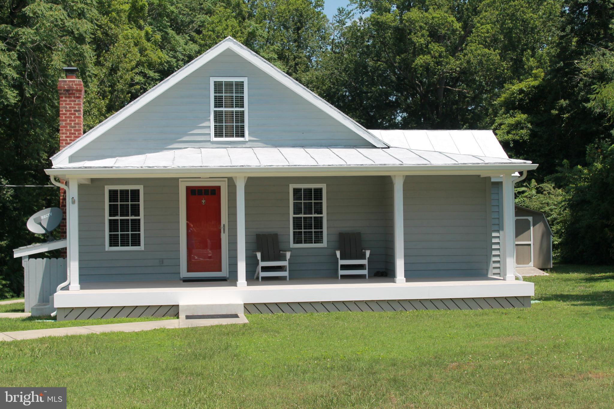 When condition counts this well-maintained single level home is exactly what you are looking for. Sitting on a one-acre lot in the quaint town of Montross this home has all of the features you would like to have and more. There is plenty of off-street parking on the circular driveway complete with added parking pad. Greet your guests on the large rocking chair front porch or just enjoy your morning coffee or afternoon beverage watching the sunset. Once inside you will notice the beautiful hardwood floors and warming wood stove in the living room. Have dinner gatherings in the dining room or BBQ's on the expansive back deck overlooking the backyard surrounded by trees for added privacy. After a long day retire to one of the two bedrooms each compete with a double sized closet for added storage., Imagine waking to the rain falling gently on the freshly painted metal roof.  The main floor is complete with an oversized laundry room with extra sink and room for storage.  Great condition and a convenient location it's what you have been looking for so schedule a time to see it today!