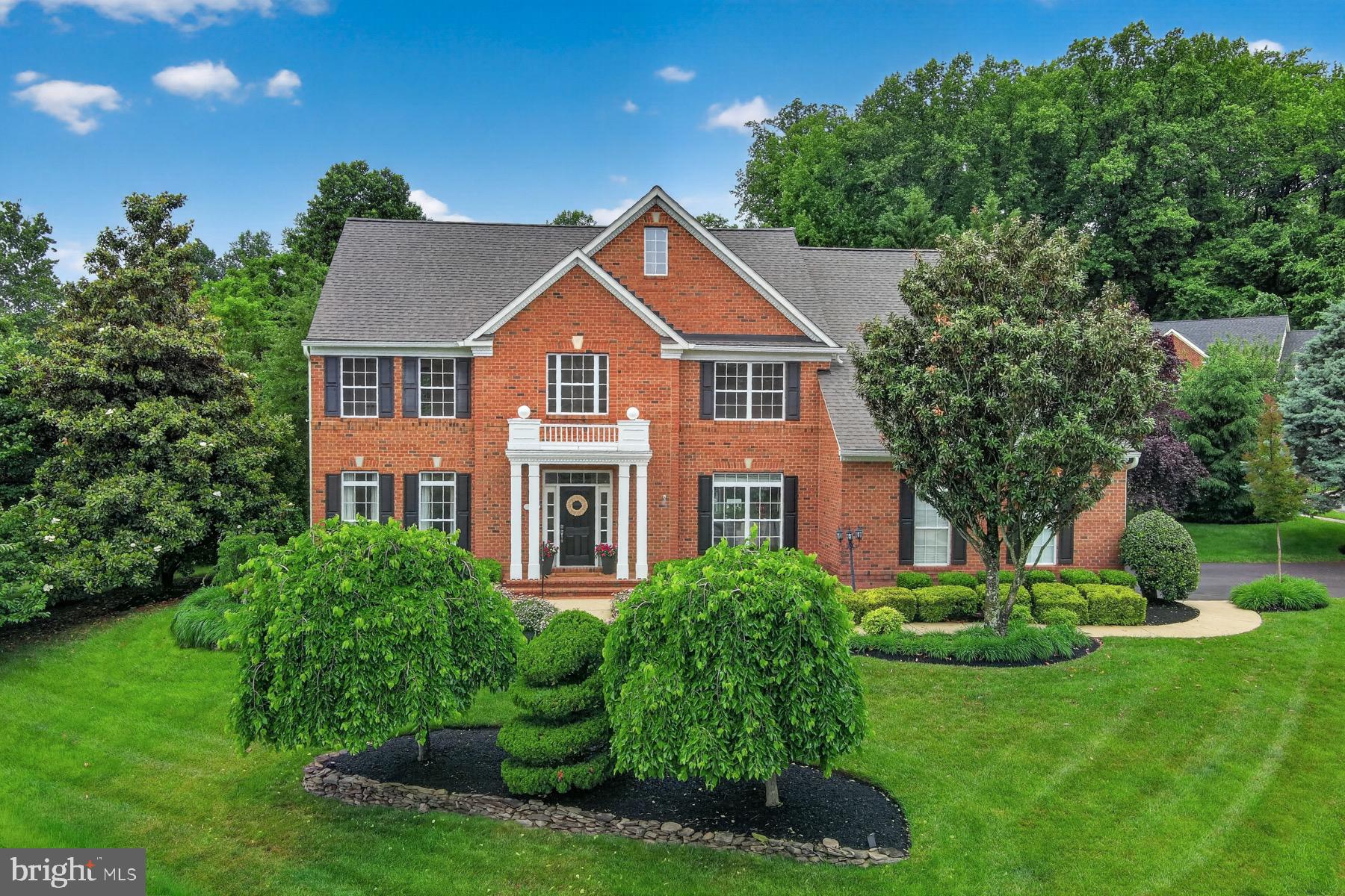 Nestled in the highly sought-after South River Colony neighborhood, this exquisite former model home seamlessly blends elegance, comfort, and thoughtful upgrades. Perfectly positioned on a corner lot and on  a serene cul-de-sac, it boasts breathtaking views of the championship golf course.

From the moment you step into the grand two-story foyer, you’ll notice the meticulous updates that make this home truly shine. The interiors have been freshly painted in a sophisticated palette, and the refinished hardwood floors gleam, reflecting the natural light that pours in the home.The two-story family room, centered around a stunning stone gas fireplace and plantation shutters flows effortlessly into the chef’s kitchen, now enhanced with a brand-NEW double oven ,stainless steel appliances, granite countertops, and ample space make this kitchen a dream for both cooking and entertaining.

Upstairs, the second level offers four generously sized bedrooms, including a luxurious primary suite. This retreat features an oversized walk-in closet, a cozy sitting area complete with a wet bar, and a two-sided gas fireplace that warms both the sitting room and the spa-like bath. The bath is a haven of relaxation with quartz countertops, dual sinks, a jacuzzi tub, and a separate shower. An additional en-suite bedroom and two more bedrooms connected by a Jack and Jill bath complete this floor.

The fully finished lower level, with NEW carpet, offers incredible versatility for multi-generational living or entertaining. It includes a second kitchen, a fifth bedroom, and a second gas stone fireplace, along with a bar, pool table, and air hockey table—all included with the home.

Outside, you’ll find a beautifully designed Trex deck with a swing, perfect for hosting gatherings or simply enjoying the tranquil surroundings. Recent upgrades, including a NEW ROOF (2025) and updated gutter system, provide peace of mind and enhance the home’s curb appeal. South River Colony is one of the areas premier communities  offering amenities such as  multiple tennis courts, two outdoor pools, pickleball, basketball, 2 large tot-lots and the opportunity to join South River Golf club.  Location of this property is perfect! Close to D.C, Baltimore, Annapolis, BWI, and plenty of shopping and dining  near by.

This home is the epitome of a luxurious lifestyle ! Whether relaxing by the golf course or enjoying the many modern updates, this house is ready to welcome you home.