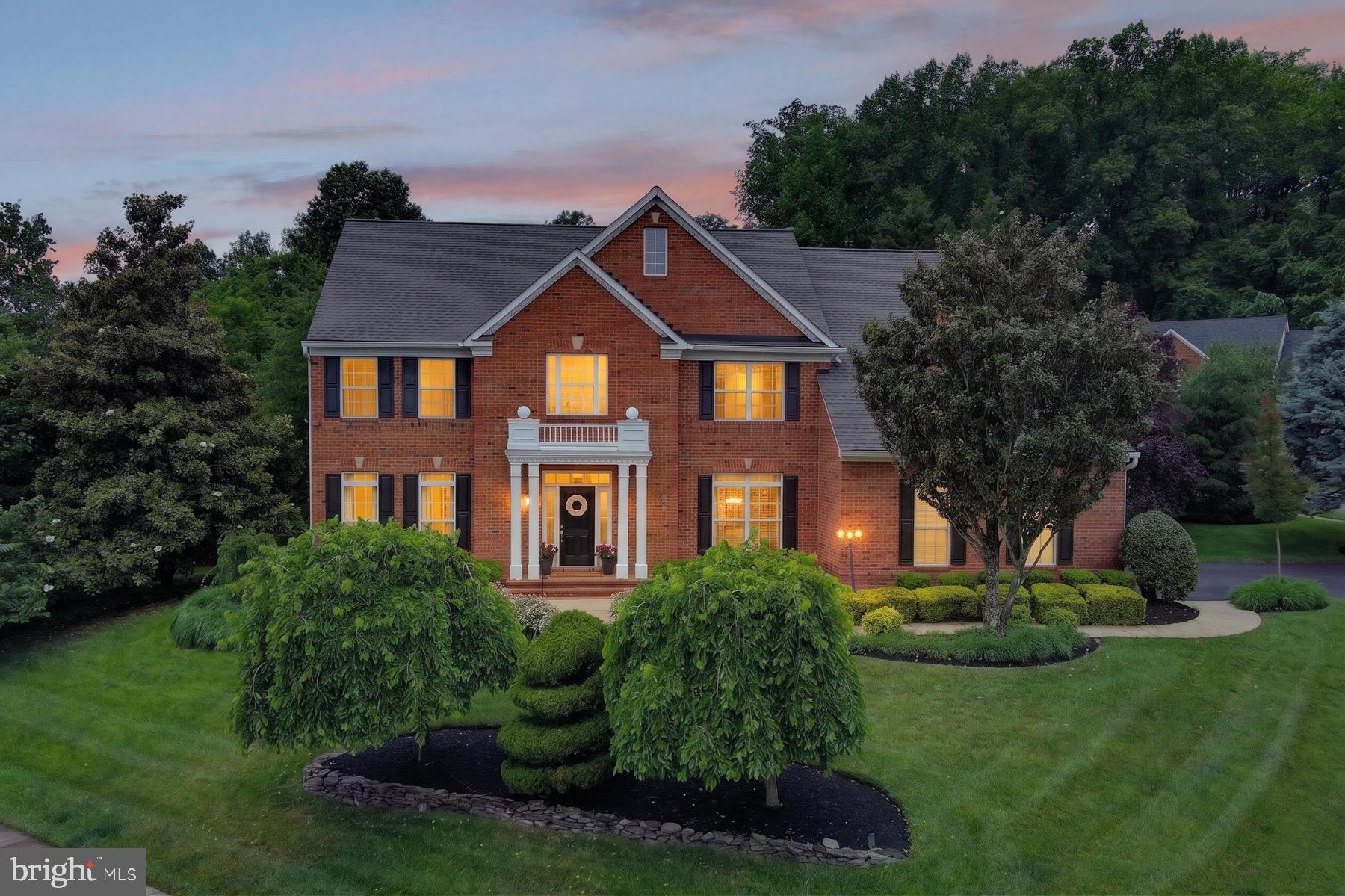 Nestled in the highly sought-after South River Colony neighborhood, this exquisite former model home seamlessly blends elegance, comfort, and thoughtful upgrades. Perfectly positioned on a corner lot and on  a serene cul-de-sac, it boasts breathtaking views of the championship golf course.

From the moment you step into the grand two-story foyer, you’ll notice the meticulous updates that make this home truly shine. The interiors have been freshly painted in a sophisticated palette, and the refinished hardwood floors gleam, reflecting the natural light that pours in the home.The two-story family room, centered around a stunning stone gas fireplace and plantation shutters flows effortlessly into the chef’s kitchen, now enhanced with a brand-NEW double oven ,stainless steel appliances, granite countertops, and ample space make this kitchen a dream for both cooking and entertaining.

Upstairs, the second level offers four generously sized bedrooms, including a luxurious primary suite. This retreat features an oversized walk-in closet, a cozy sitting area complete with a wet bar, and a two-sided gas fireplace that warms both the sitting room and the spa-like bath. The bath is a haven of relaxation with quartz countertops, dual sinks, a jacuzzi tub, and a separate shower. An additional en-suite bedroom and two more bedrooms connected by a Jack and Jill bath complete this floor.

The fully finished lower level, with NEW carpet, offers incredible versatility for multi-generational living or entertaining. It includes a second kitchen, a fifth bedroom, and a second gas stone fireplace, along with a bar, pool table, and air hockey table—all included with the home.

Outside, you’ll find a beautifully designed Trex deck with a swing, perfect for hosting gatherings or simply enjoying the tranquil surroundings. Recent upgrades, including a NEW ROOF (2025) and updated gutter system, provide peace of mind and enhance the home’s curb appeal. South River Colony is one of the areas premier communities  offering amenities such as  multiple tennis courts, two outdoor pools, pickleball, basketball, 2 large tot-lots and the opportunity to join South River Golf club.  Location of this property is perfect! Close to D.C, Baltimore, Annapolis, BWI, and plenty of shopping and dining  near by.

This home is the epitome of a luxurious lifestyle ! Whether relaxing by the golf course or enjoying the many modern updates, this house is ready to welcome you home.