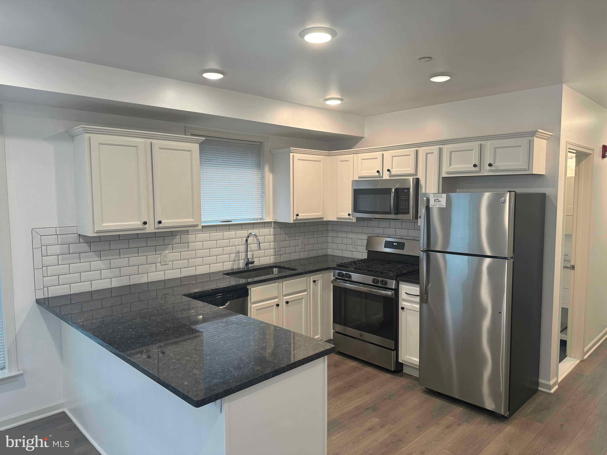 Available Now! Cute and modern 1BR/1BA apartment home located steps from the vibrant Ridge Avenue corridor! Convenient to shopping, dining, parks, transit, and more! Your new home features easy-to-clean laminate wood flooring, your own washer/dryer, and central AC/heat to keep you comfy year-round. Large windows let in ton of natural light! Entertaining is a breeze with a fully-equipped kitchen with stainless steel appliances, custom granite countertops, and built-in kitchen island. Easily pay rent and submit service requests online through our resident portal! Plus, we are 100% pet friendly with NO PET FEES OR DEPOSITS! Parking is available in the attached lot from ParkAmerica ($75/month). This home will not last long - apply today!

**Leasing Special** One month free on a 13+ lease agreement. Last month's rent not required for well-qualified applicants!
