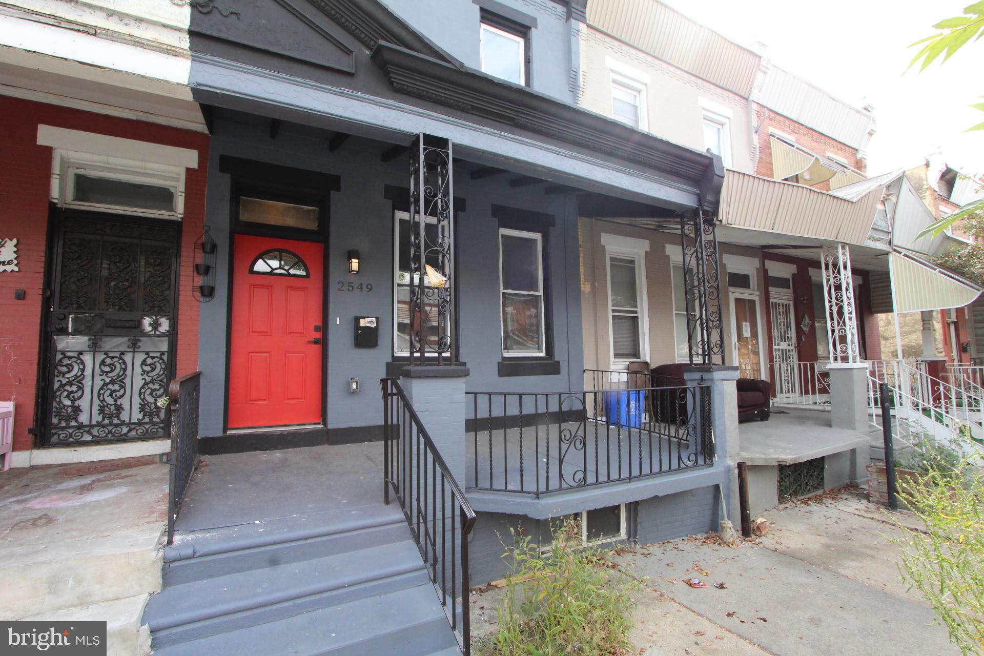 Explore this beautifully renovated 3-bedroom row home in Philadelphia! The open-concept layout features recessed lighting, wide plank floors, and original architectural columns that add character. The modern kitchen boasts white shaker cabinets, granite countertops, a subway tile backsplash, and a spacious center island with a sink. Fresh paint and abundant natural light create an inviting atmosphere. Enjoy the charming front porch and the prime location near Temple University, public transit, shops, and dining. This move-in-ready home is waiting for you—don’t miss your chance to make it yours!