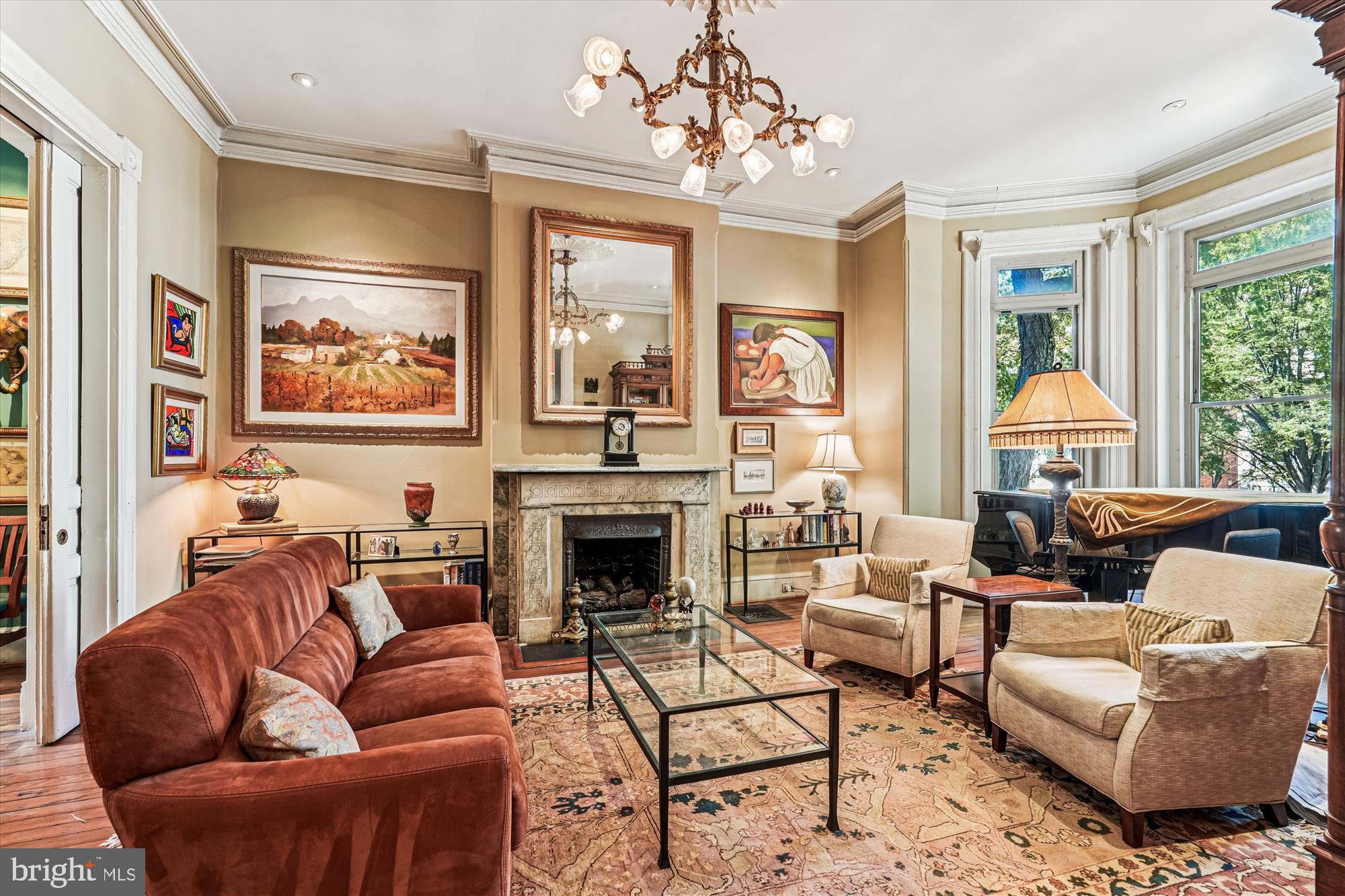 LOCATION! LOCATION! LOCATION! 1420 Q Street, NW, is an exceptional property located in the heart of historic Logan Circle. This 1880’s, 21.5’ wide, four level Eastlake Victorian offers an incredible opportunity to reside on the Best Block adjacent to the vibrant 14th Street Corridor. HIGHTLIGHTS: 6BRs/3.5BAs; 4,200 sq. ft.; Ceiling heights: 11’,10’ , 9’; Zoning Approved lot coverage expanded from 60% to 66.14%; Huge south and west facing deck off the Kitchen; 2 car parking; VACANT 1BR English Basement apartment (previously rented at $2,685/mo); Newer systems (HVAC, W/D, W/H, Kitchen appliances). The elegant proportions of this grand home offer a comfort and refinement only found in a truly exceptional property. The home is accented throughout with heart pine floors, plaster ceiling medallions and crown moldings. On the main level, two Eastlake marble mantels (with gas log sets), a north facing bay and two turn-of-the-century chandeliers add Gilded Age ambience for the Living and Dining Rooms. The Kitchen features an energy efficient LG refrigerator, Bosch D/W, vented commercial grade range hood, soft close cabinets, LED lighting, oversized S.S. deep sink, conveniently located pantry for extra storage and a Powder Room. The home’s entire second level is a Primary Bedroom Suite (See DOCUMENTS for architect designed re-imaged PBR/PBA). The spacious Bedroom features an arched sleeping alcove, crown moldings and heart pine floors. The Primary Bathroom features a jetted tub, dual sinks, separate shower, linen closet and updated Kohler faucets/showerhead. The middle Bedroom currently serves as a Den/Library and features a marble mantel (gas log set), and built-in bookcases. The hallway features custom-designed closet storage systems and new stacked high-efficiency Electrolux W/D. The third level features three Bedrooms. The multi-function rear BR could easily be used as a home office as it features built-in cherry cabinets, SS bar sink, granite counters and an under-counter refrigerator. The updated hall bathroom features heated Carrara marble floors, glass shower enclosure and linen closet. The one Bedroom English basement apartment’s living space features a gas fireplace, Kitchen w/ stacked Bosch W/D, gas furnace and 50-gallon water heater (both new in 2021), large BR with walk-in closet plus front and rear unit egress. Previously rented for $2,685 a month (utilities inclusive), and with a Certificate of Occupancy, it provides an attractive contribution to a Buyers’ monthly mortgage payment. The expansive main level south and west facing rear deck was designed with low maintenance Trex decking, red cedar privacy walls and stainless-steel cable railings. The stairs and blue stone paver pathway lead to two car parking and under-deck storage. In addition to the original cast iron railings, the 1880’s brick façade features black accent brick work with stepped brick cornice and slate windowsills. The HVAC for the main house and the rental unit were installed in 2021. With this incredible location, you can easily imagine living in the heart of vibrant Logan Circle, steps to award winning restaurants, theater, coffee shops and grocery stores (Whole Foods, Trader Joe’s).