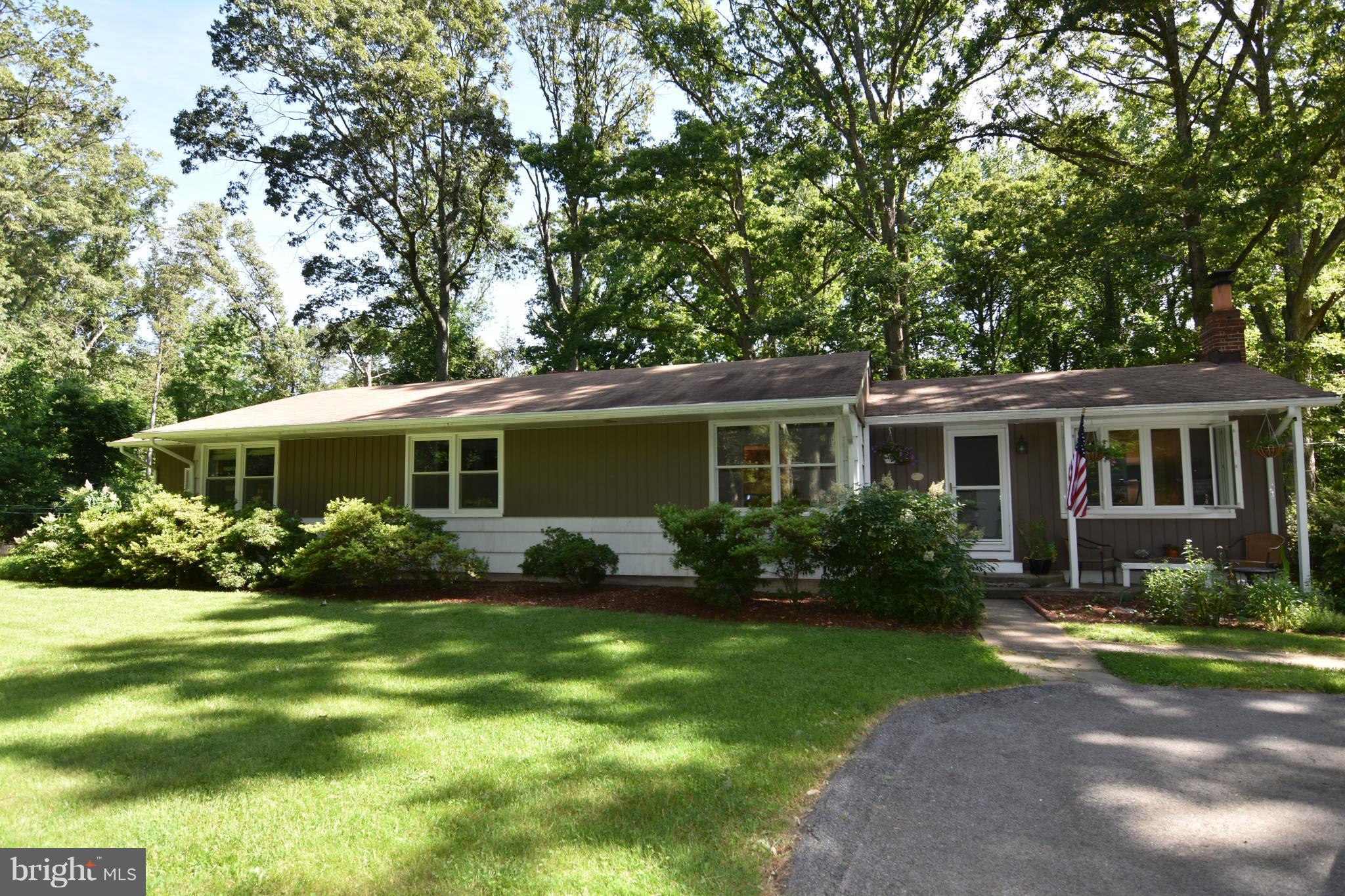 Beautiful Private lot yet convenient to shopping & dining.  House sits on a double lot with plenty of yard space all around. Enjoy peaceful evenings on the back patio or the screened porch... Heat pump installed 09, most windows  replaced in 2012,  Appliances in 2014. See attached list & disclosure for all other details.  Hardwood floors thru out.  Wood stove in basement.
