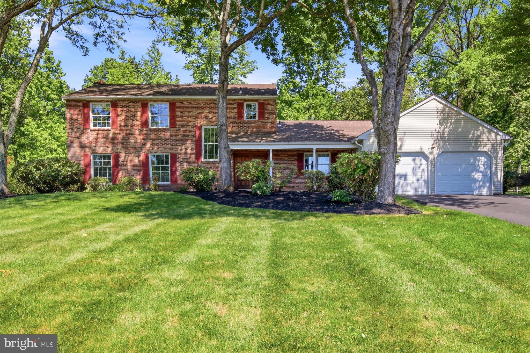 Open House - Saturday, June 6th from 11:00-1:00. Welcome to 15 Brookdale Drive and historic Bucks County, Pennsylvania! One of 12 covered bridges you will see and drive through on the way to this beautiful, custom-built colonial! This is a rare opportunity to own a home being offered for the first time by its original owners of over 50 years. Nestled on a spectacular private lot backing to serene woods and located within a highly sought-after school district, this custom-built home offers a rare opportunity to create your dream residence in an exceptional setting. With expansive living spaces, solid construction, and endless potential, the true value lies in the combination of location, lot, and square footage.

Step inside the grand foyer featuring custom tilework and discover a flexible floor plan designed for both everyday living and entertaining. Just off the entry is a versatile flex space ideal for a home office, library, playroom, or study. The formal dining room flows seamlessly into the kitchen, sun-filled breakfast area, and convenient laundry room, which provides access to both the oversized two-car garage and backyard.

The main level continues with an exceptionally large formal living room providing an elegant space for entertaining guests, and an adjacent powder room. Beyond, the spacious family room with a wood-burning fireplace serves as the heart of the home, offering ample room for comfortable everyday living. Adjacent to the family room, the sun-drenched Florida room is surrounded by views of the picturesque backyard and wooded landscape, creating a peaceful retreat that seamlessly connects indoor and outdoor living.   The home's generous footprint provides room for everyone while offering endless possibilities for modernization and customization.

Upstairs, the primary suite features a private en-suite bath, while three additional bedrooms share a full hall bathroom. The partially finished basement further expands the living space, offering potential for additional bedrooms, a home office, a gym, hobby rooms, or recreation areas.

Outside, enjoy the oversized backyard with a tranquil wooded backdrop, offering privacy and space rarely found in today's market. Additional highlights include a permanently installed Generac whole-home standby generator for peace of mind and major improvements such as updated roofing and replacement windows.

This property presents an incredible opportunity to invest in one of the area's most desirable locations. Convenient to Peace Valley Park for boating, hiking, and biking, and local Covered Bridge Park, which offers bike and walk trails and plenty of playground equipment for the family. The Covered Bridge Park offers a day camp in the summertime, and there is ice skating on the pond in the winter! Blue Ribbon Central Bucks School District. Don't wait to schedule your appointment to make this your forever home!